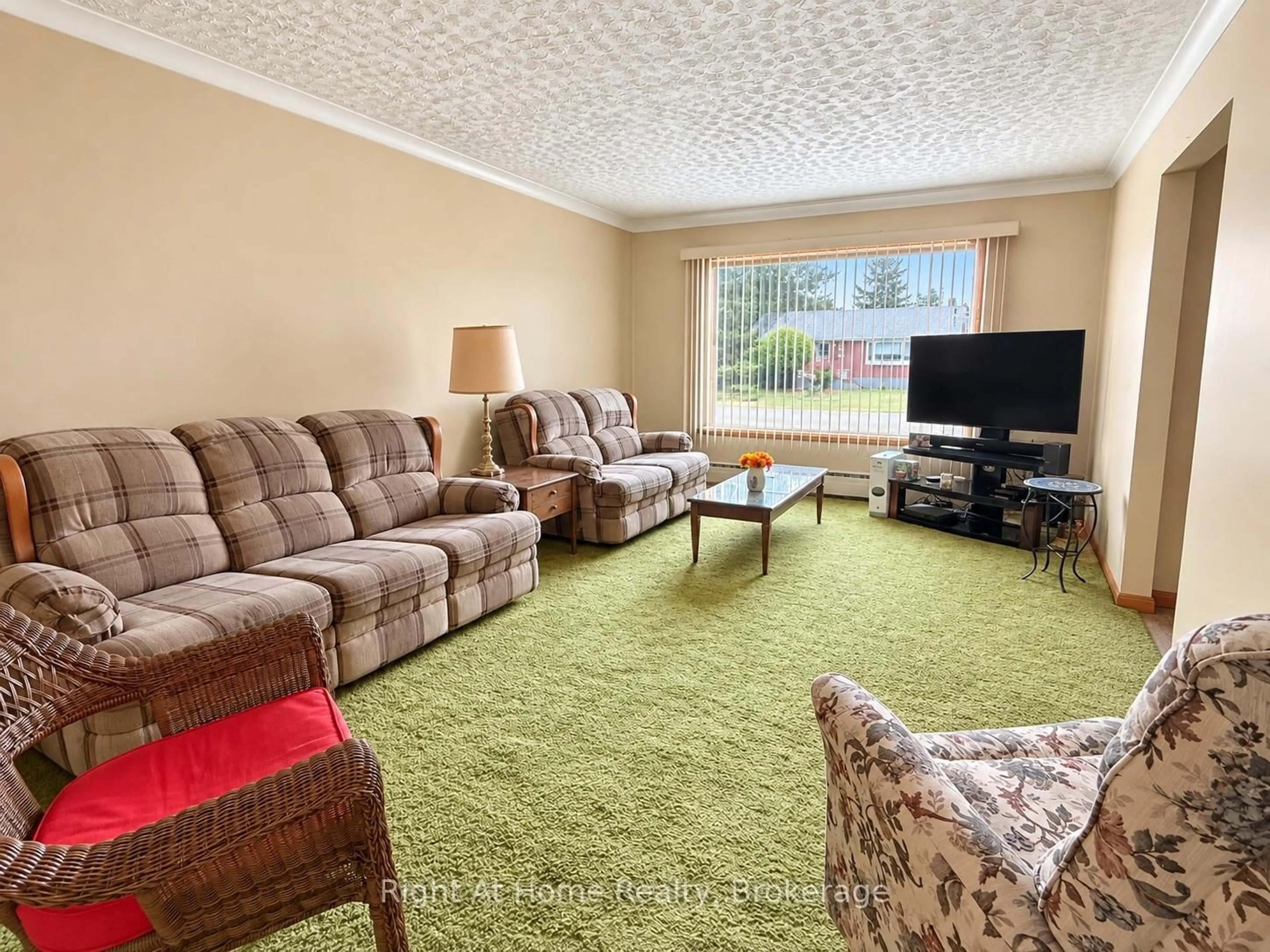 Living room with furniture, carpet floor for 123 Shipley St, Thunder Bay Ontario P7A 3C6