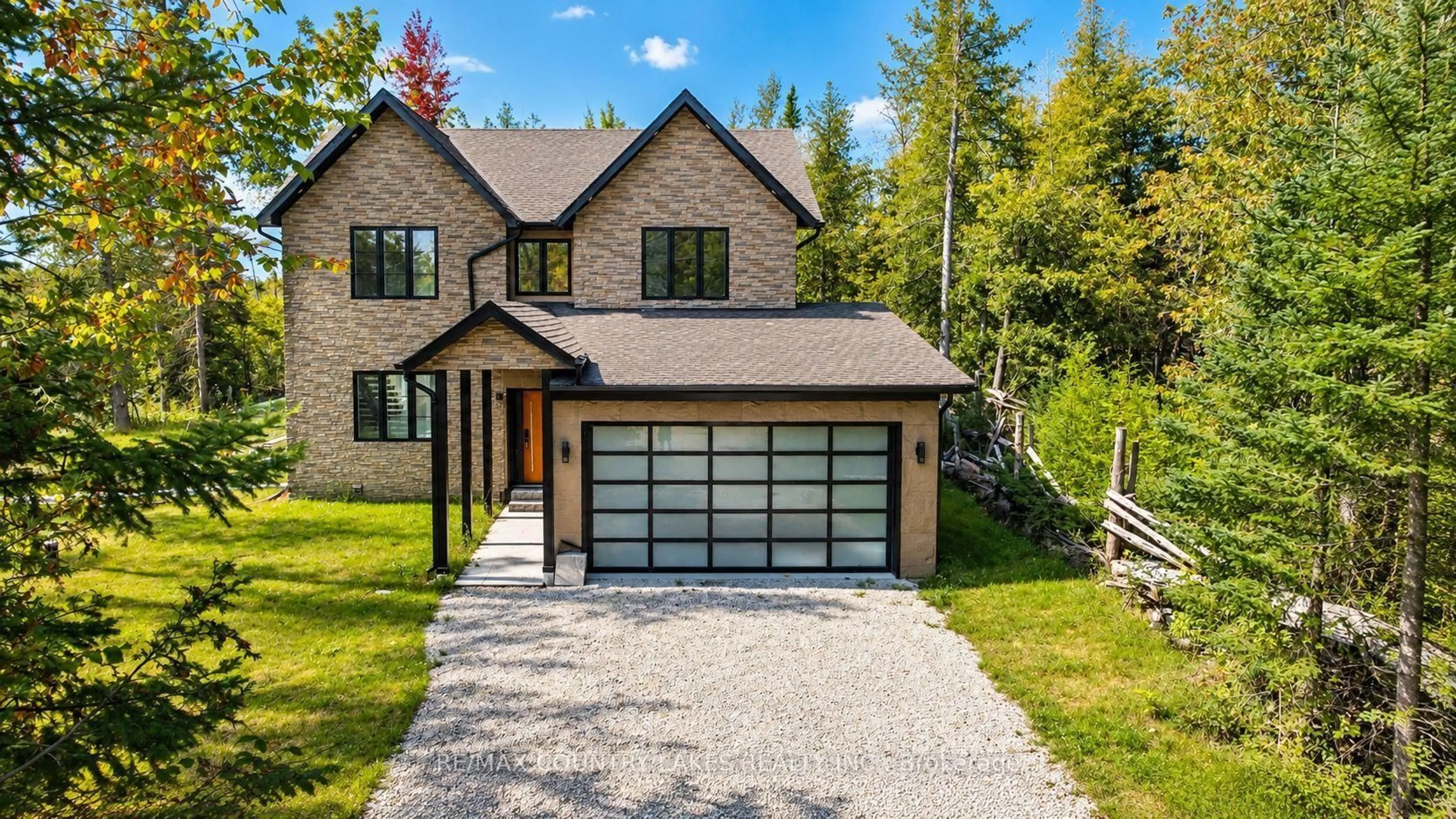 Home with brick exterior material, street for 445 Martin's Rd, Kawartha Lakes Ontario K0M 1N0
