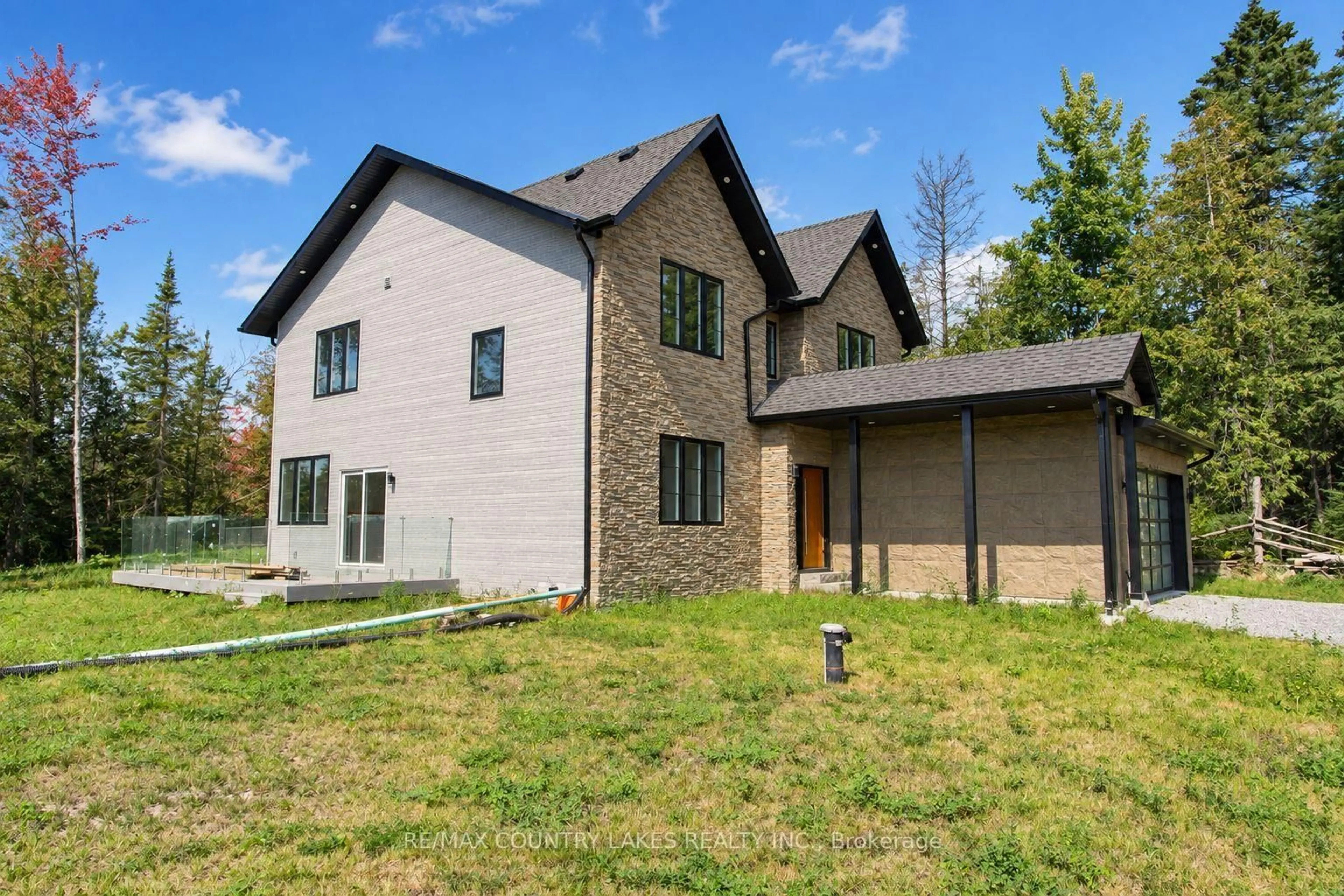 Home with brick exterior material, unknown for 445 Martin's Rd, Kawartha Lakes Ontario K0M 1N0