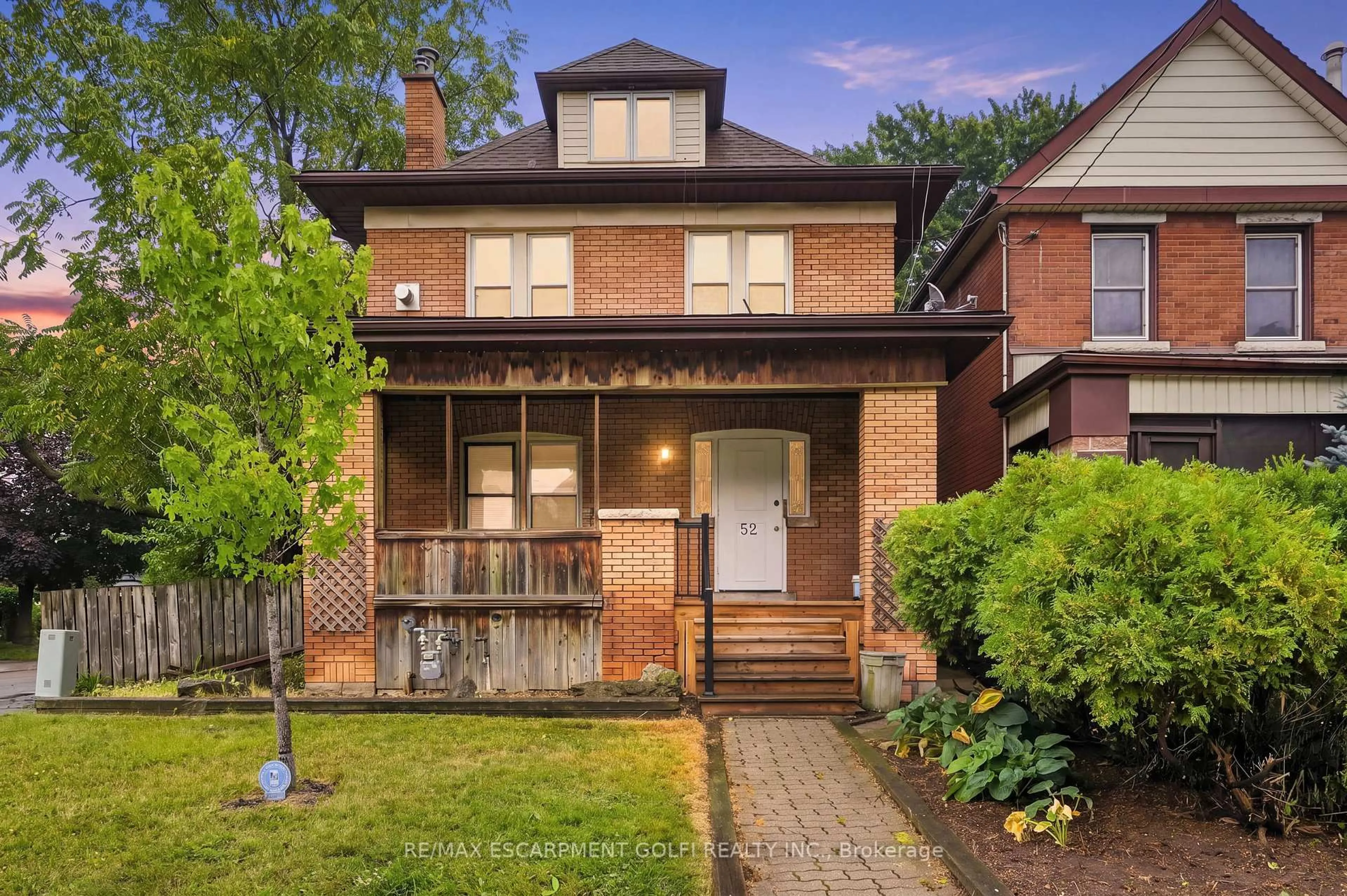 Home with brick exterior material, street for 52 Kensington Ave, Hamilton Ontario L8L 7M9