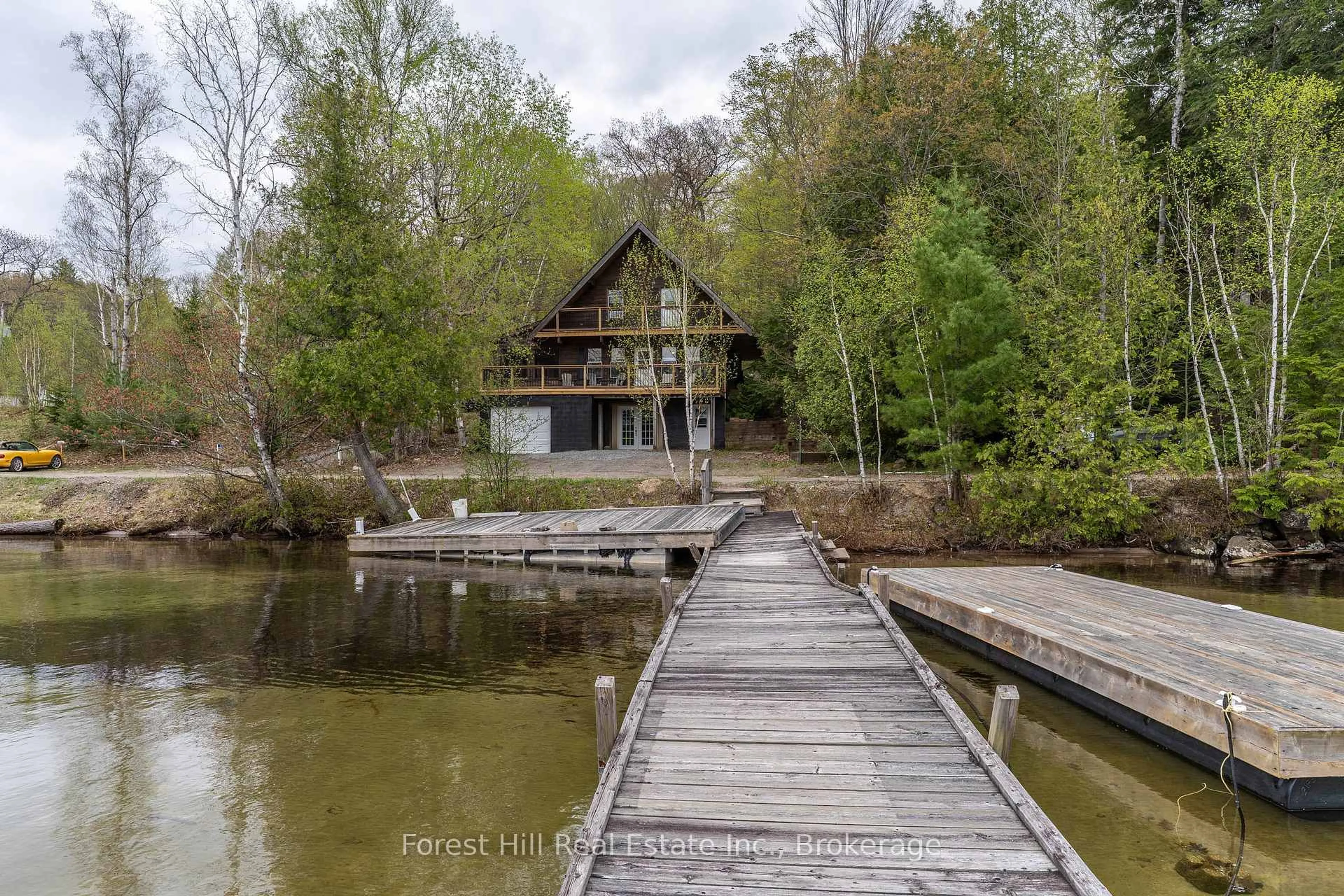 A pic from outside/outdoor area/front of a property/back of a property/a pic from drone, water/lake/river/ocean view for 1255 Skeleton Lake 2 Rd, Muskoka Lakes Ontario P0G 1G0
