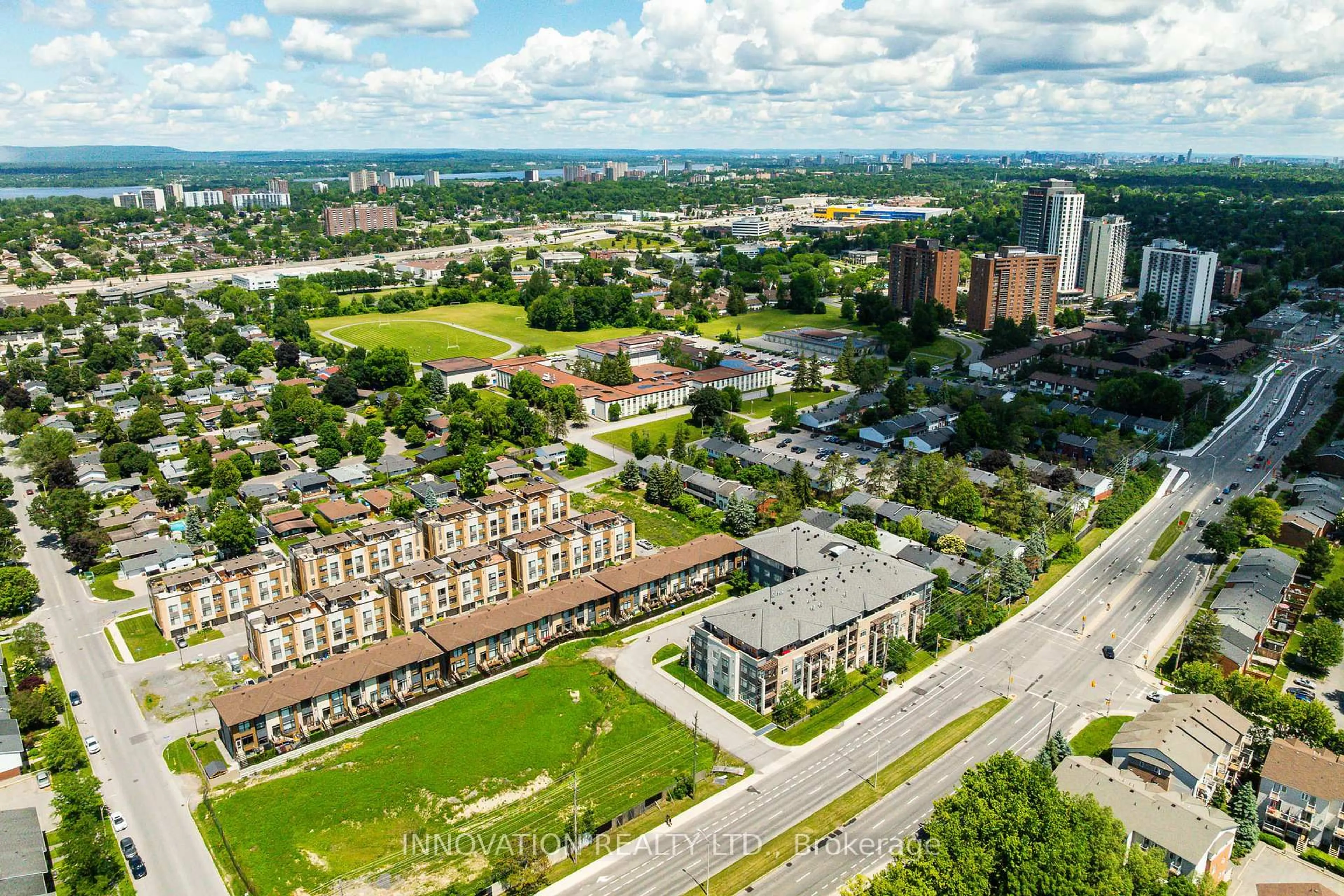 A pic from outside/outdoor area/front of a property/back of a property/a pic from drone, city buildings view from balcony for 2785 Baseline Rd #311, Ottawa Ontario K2H 0B7