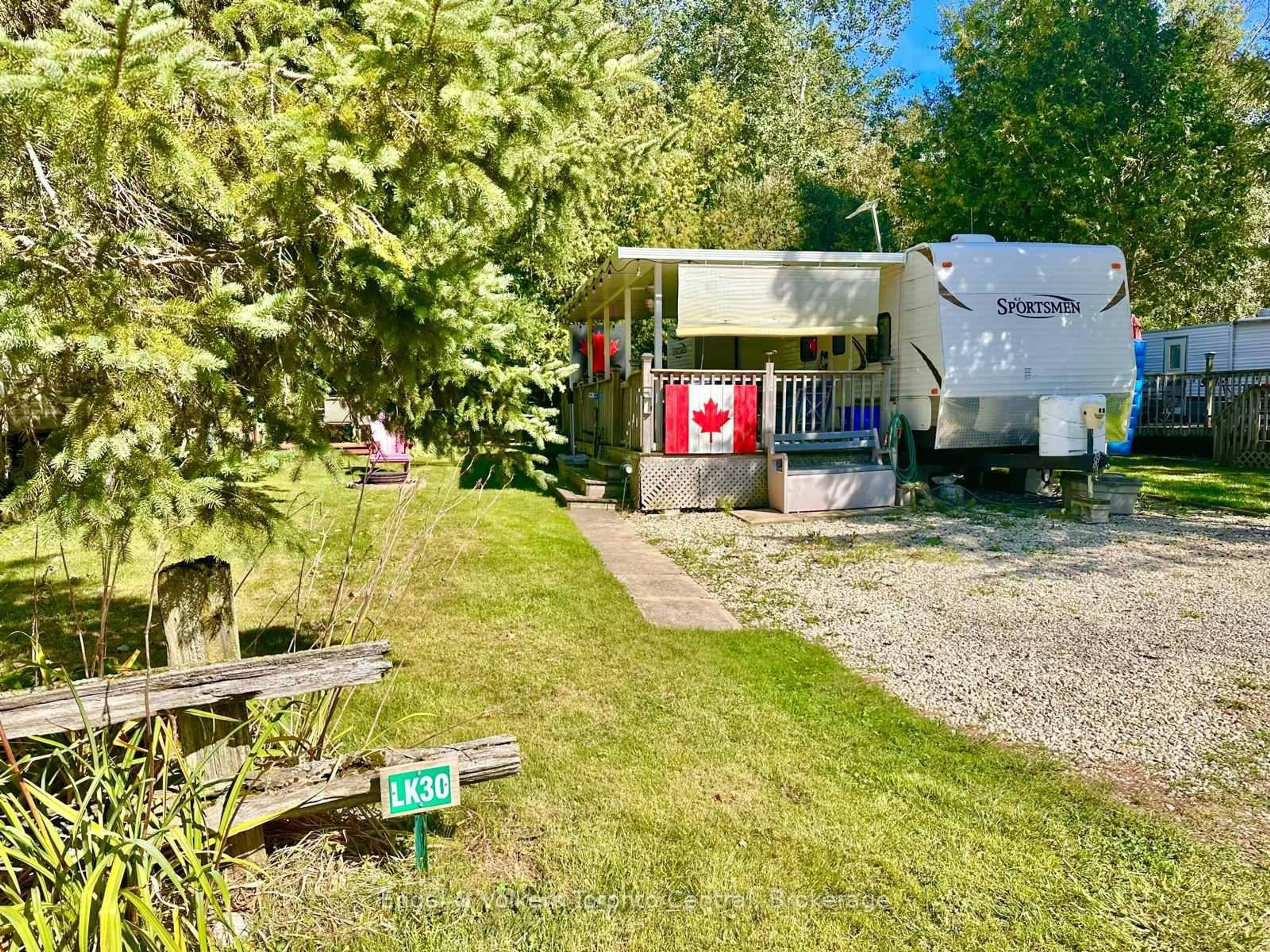 A pic from outside/outdoor area/front of a property/back of a property/a pic from drone, street for 7489 SIDEROAD 5 E #L 30, Wellington North Ontario N0G 2L0