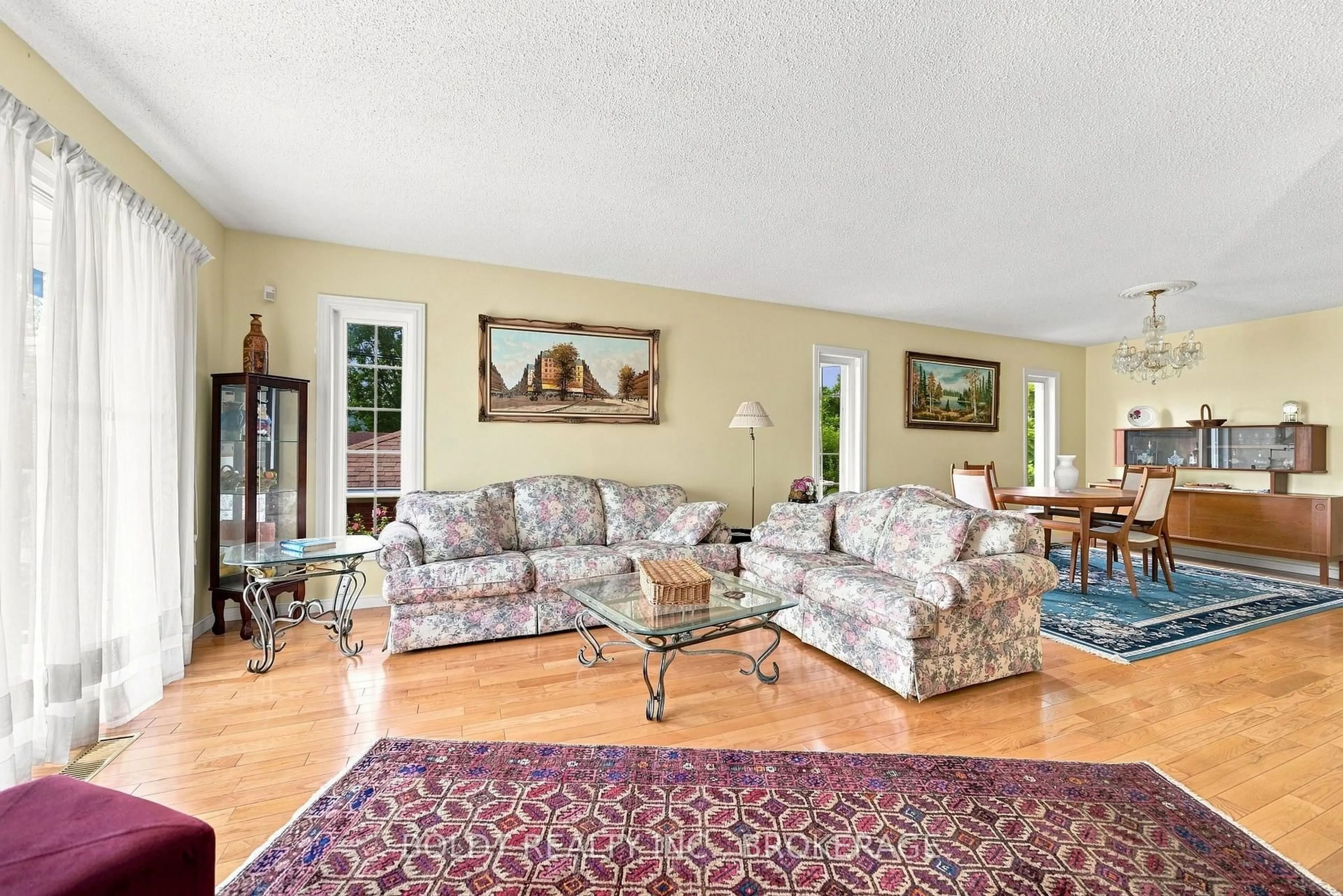 Living room with furniture, unknown for 233 Fruitland Rd, Hamilton Ontario L8E 5J8