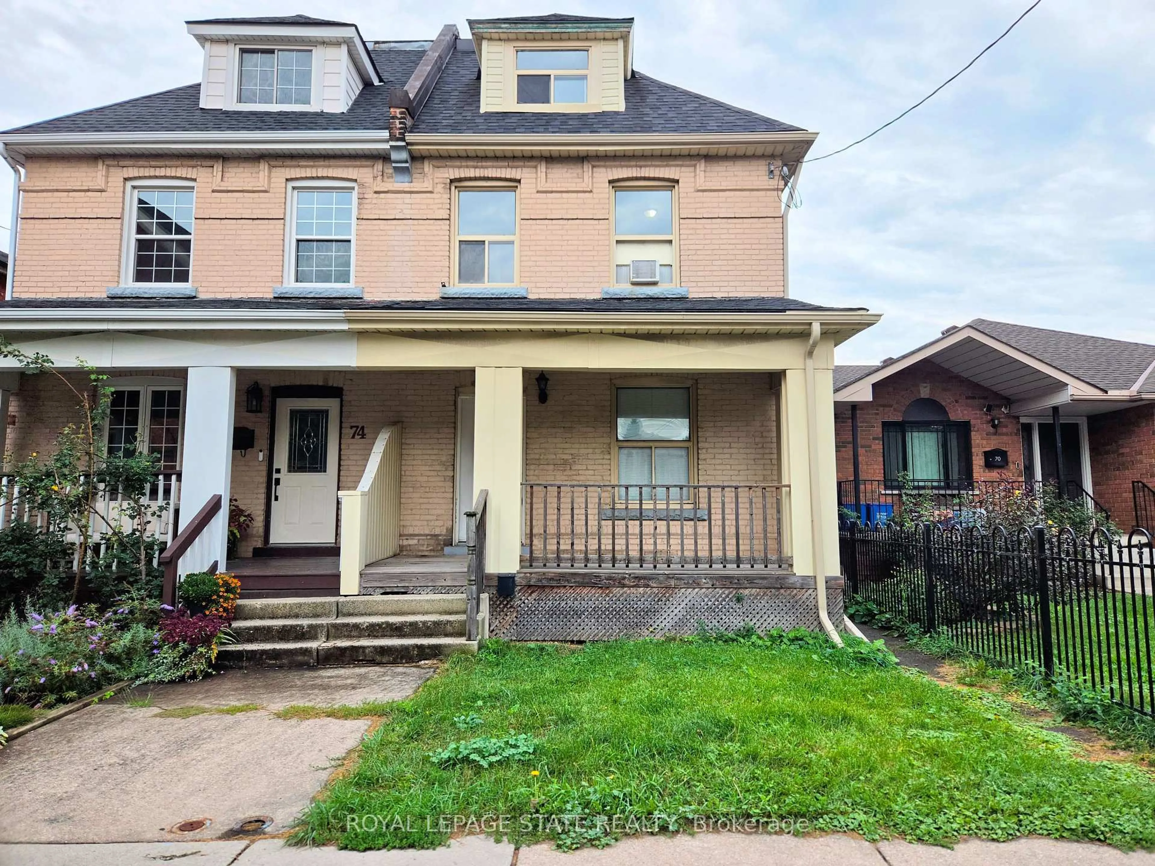 Home with brick exterior material, street for 72 Emerald St, Hamilton Ontario L8L 5K3