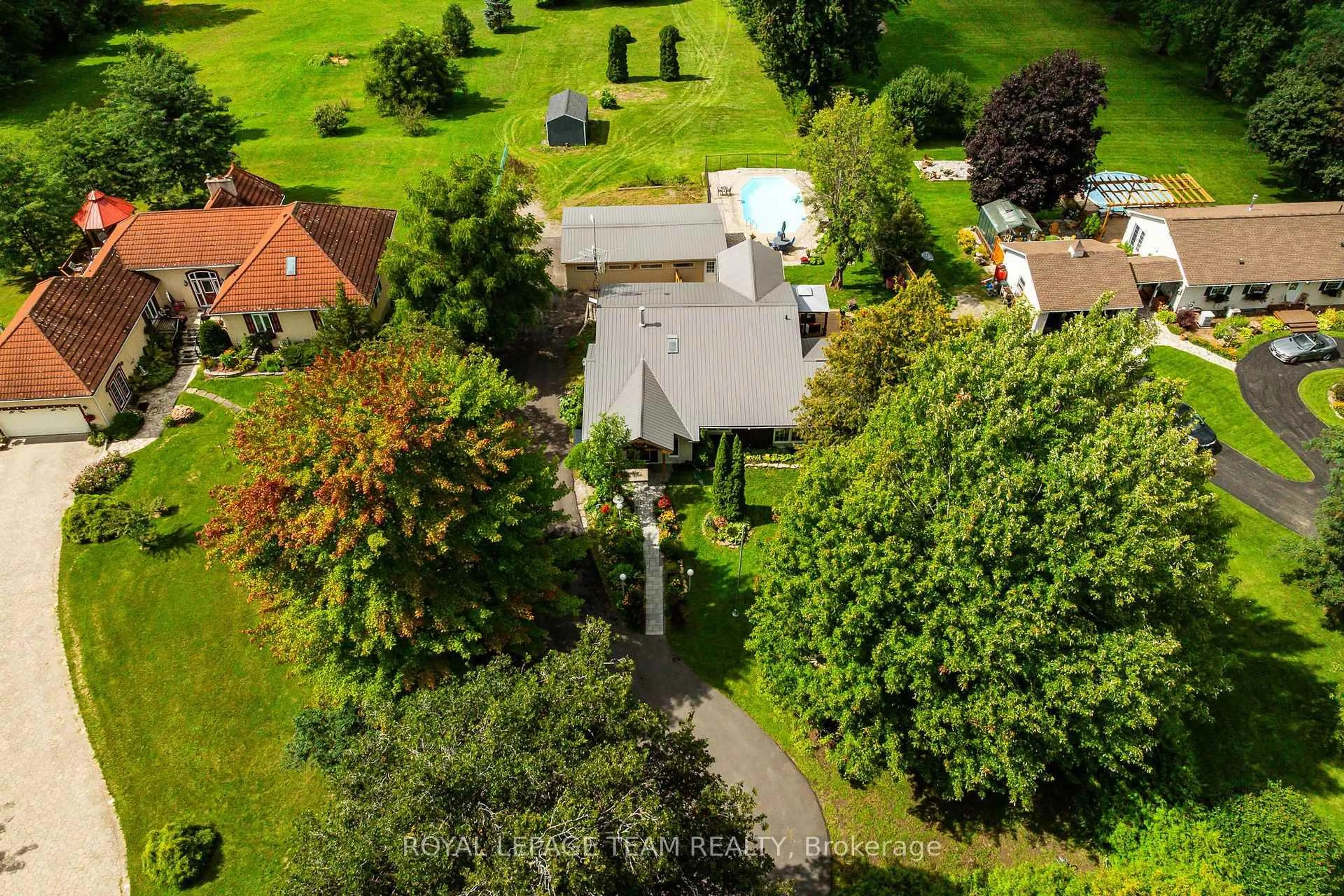 A pic from outside/outdoor area/front of a property/back of a property/a pic from drone, street for 301 County Rd 23 Rd, Merrickville-Wolford Ontario K0G 1N0