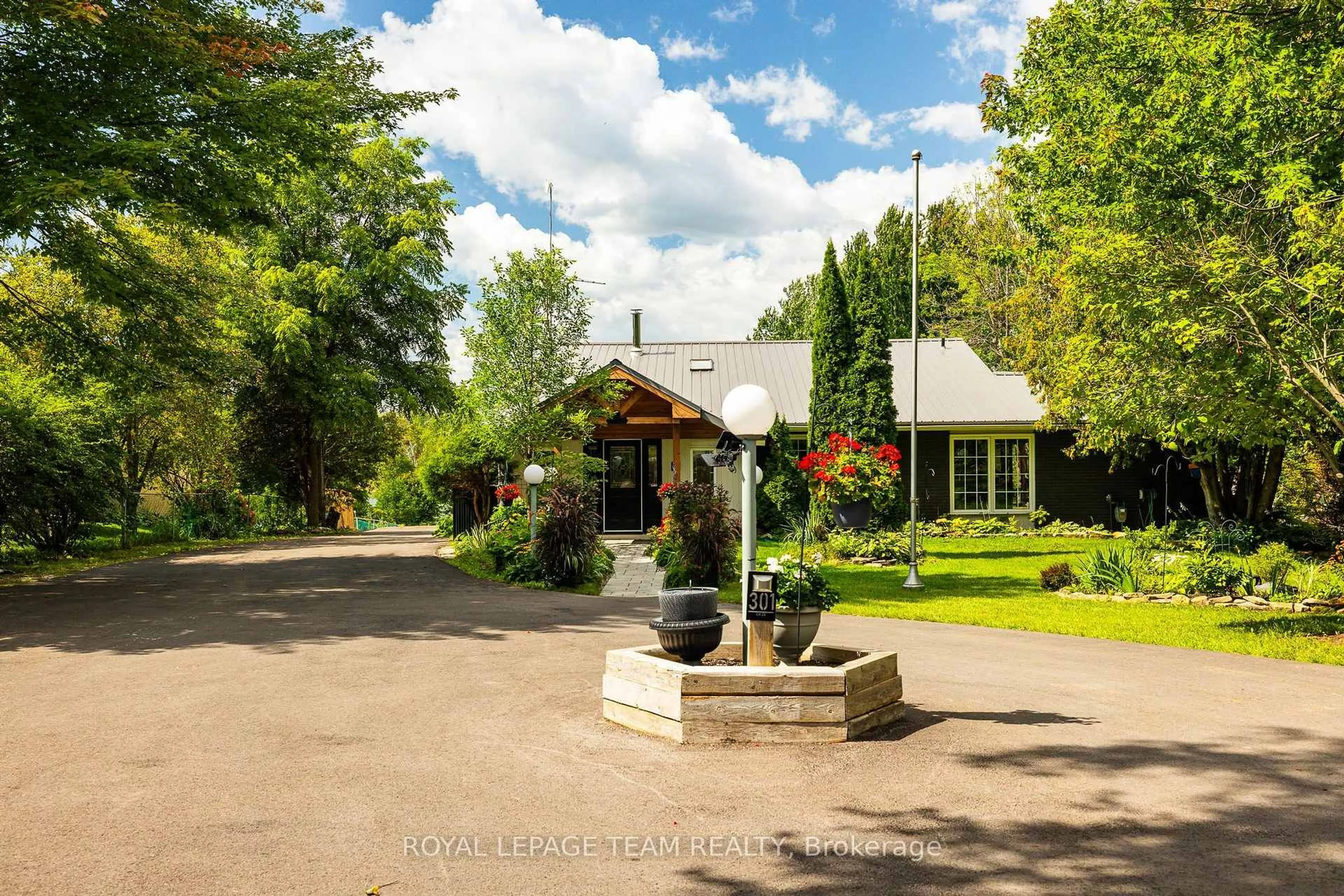 A pic from outside/outdoor area/front of a property/back of a property/a pic from drone, street for 301 County Rd 23 Rd, Merrickville-Wolford Ontario K0G 1N0