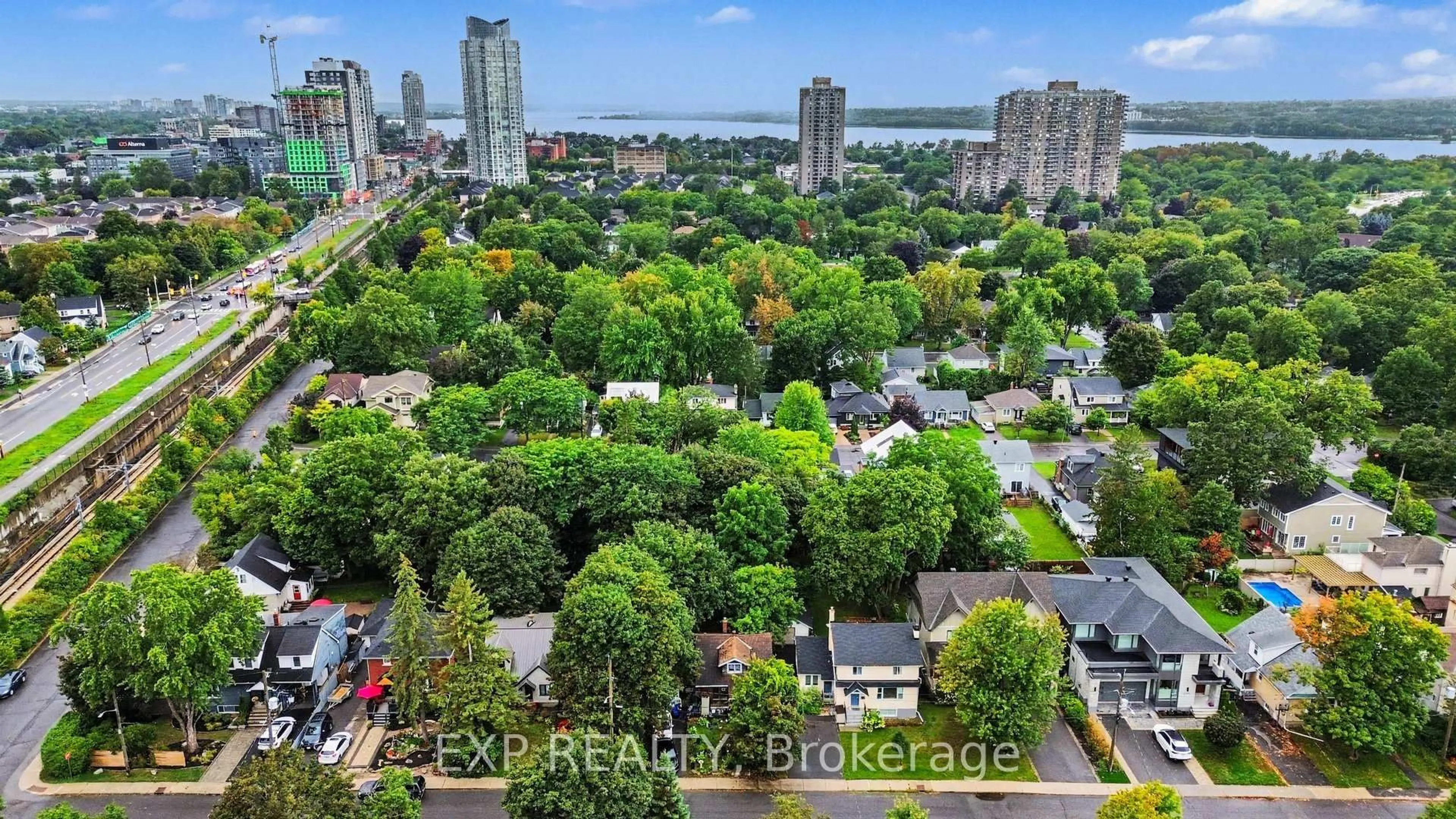A pic from outside/outdoor area/front of a property/back of a property/a pic from drone, city buildings view from balcony for 252 Cowley Ave, Ottawa Ontario K1Y 0H1