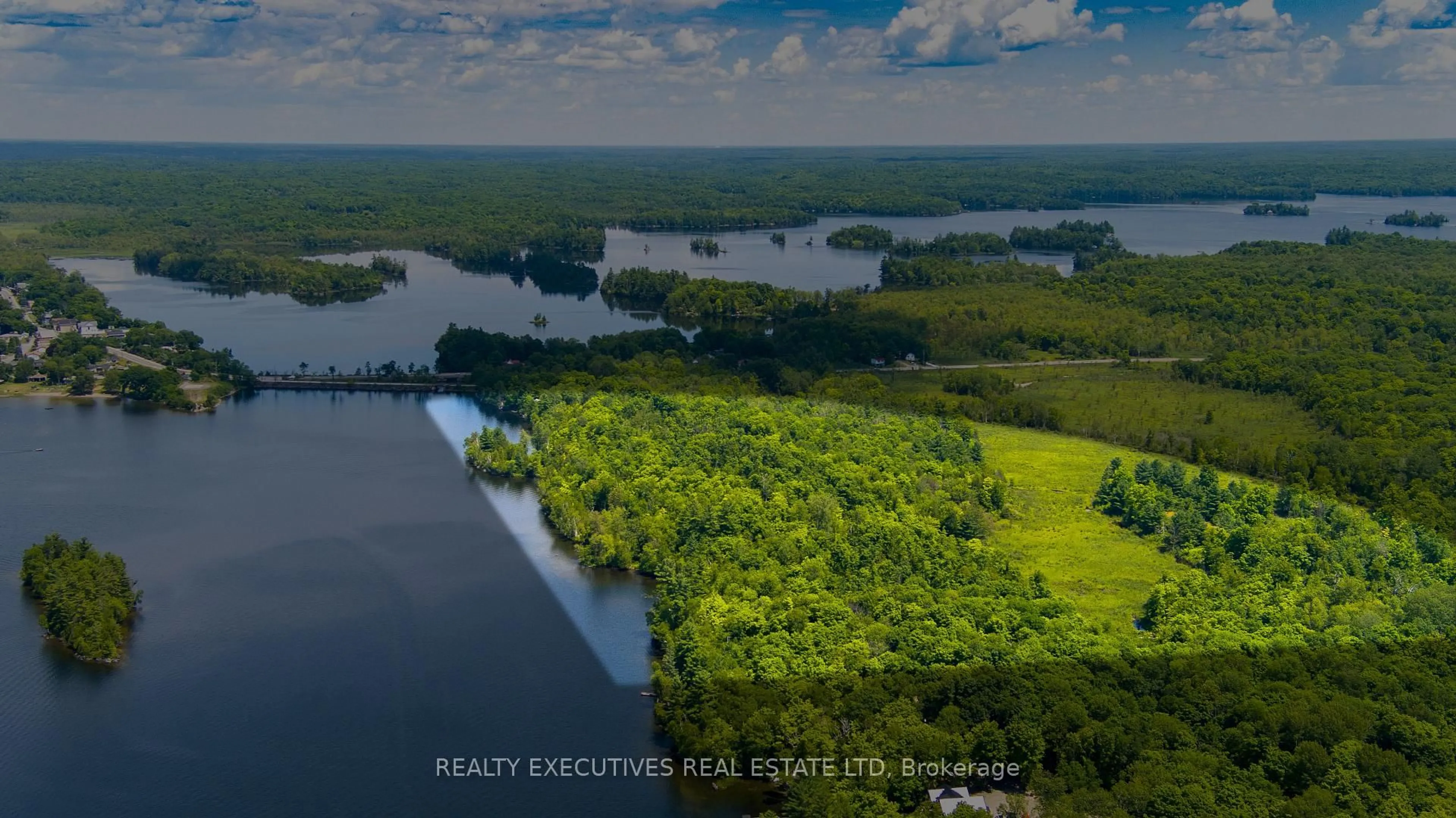 A pic from outside/outdoor area/front of a property/back of a property/a pic from drone, water/lake/river/ocean view for 1014A Brewer Rd, Sharbot Lake Ontario K0H 2P0