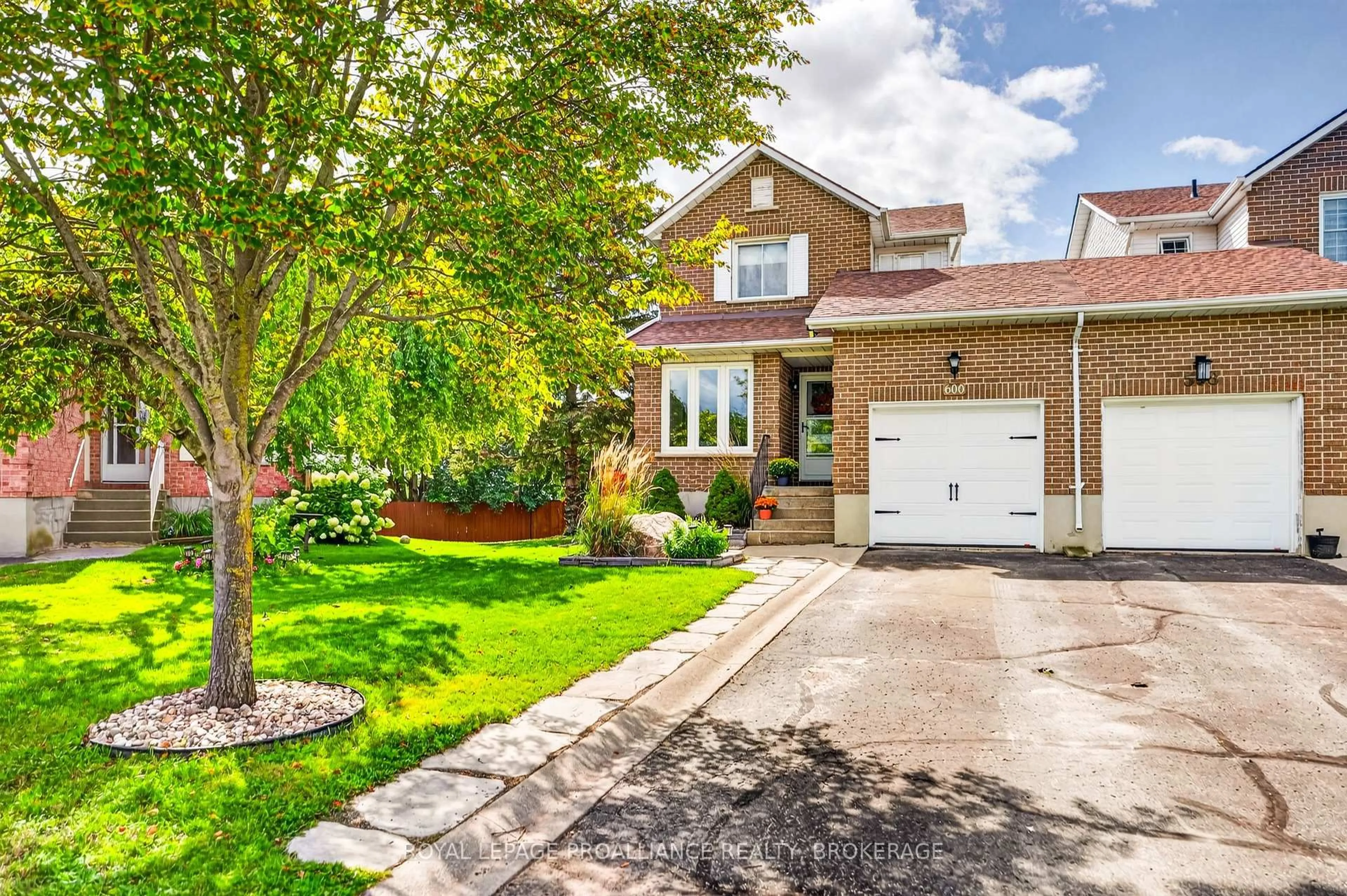 Home with brick exterior material, street for 600 Whistler Terr, Kingston Ontario K7M 8K4