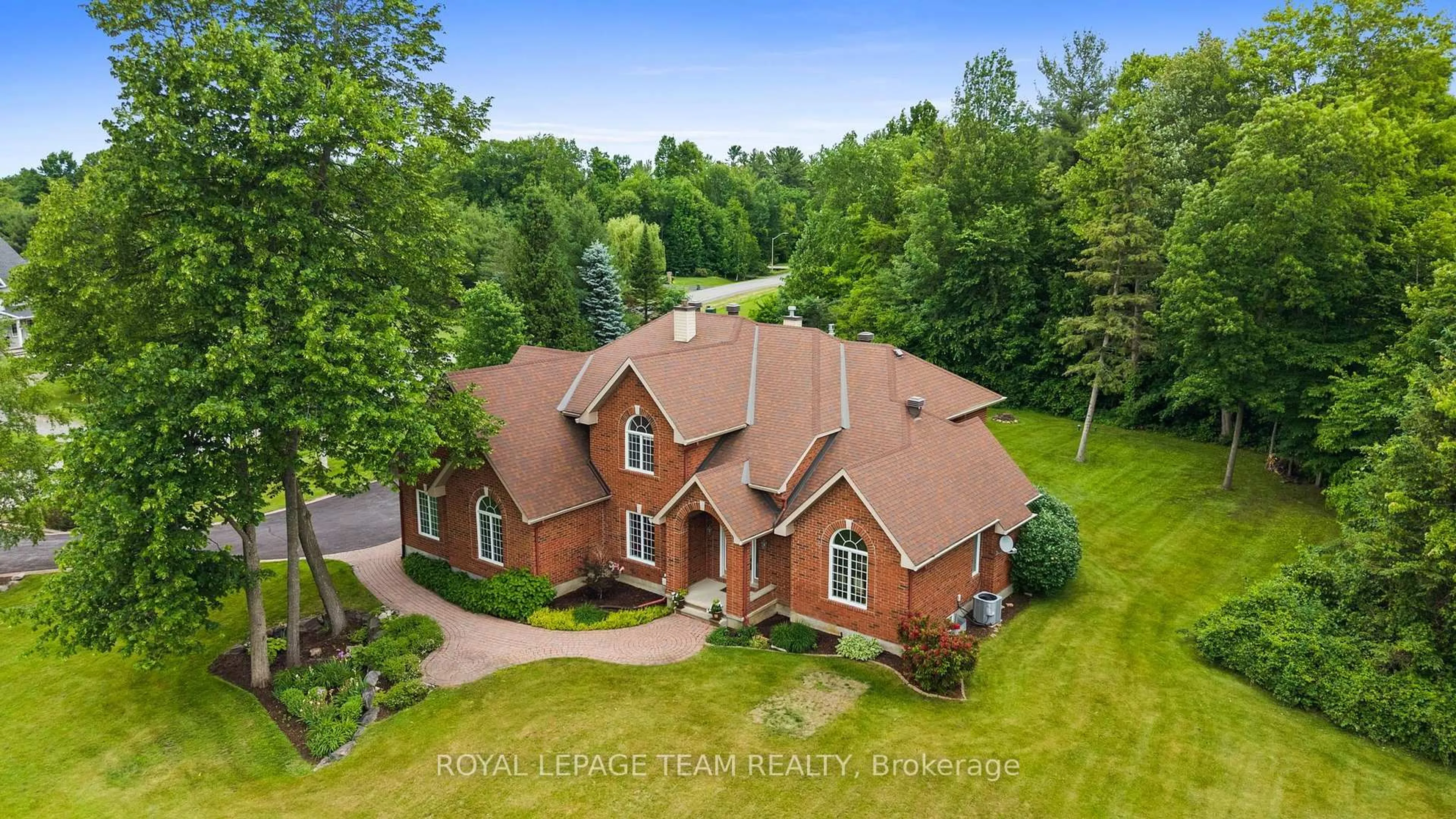 A pic from outside/outdoor area/front of a property/back of a property/a pic from drone, unknown for 50 Marchvale Dr, Ottawa Ontario K2W 1C2