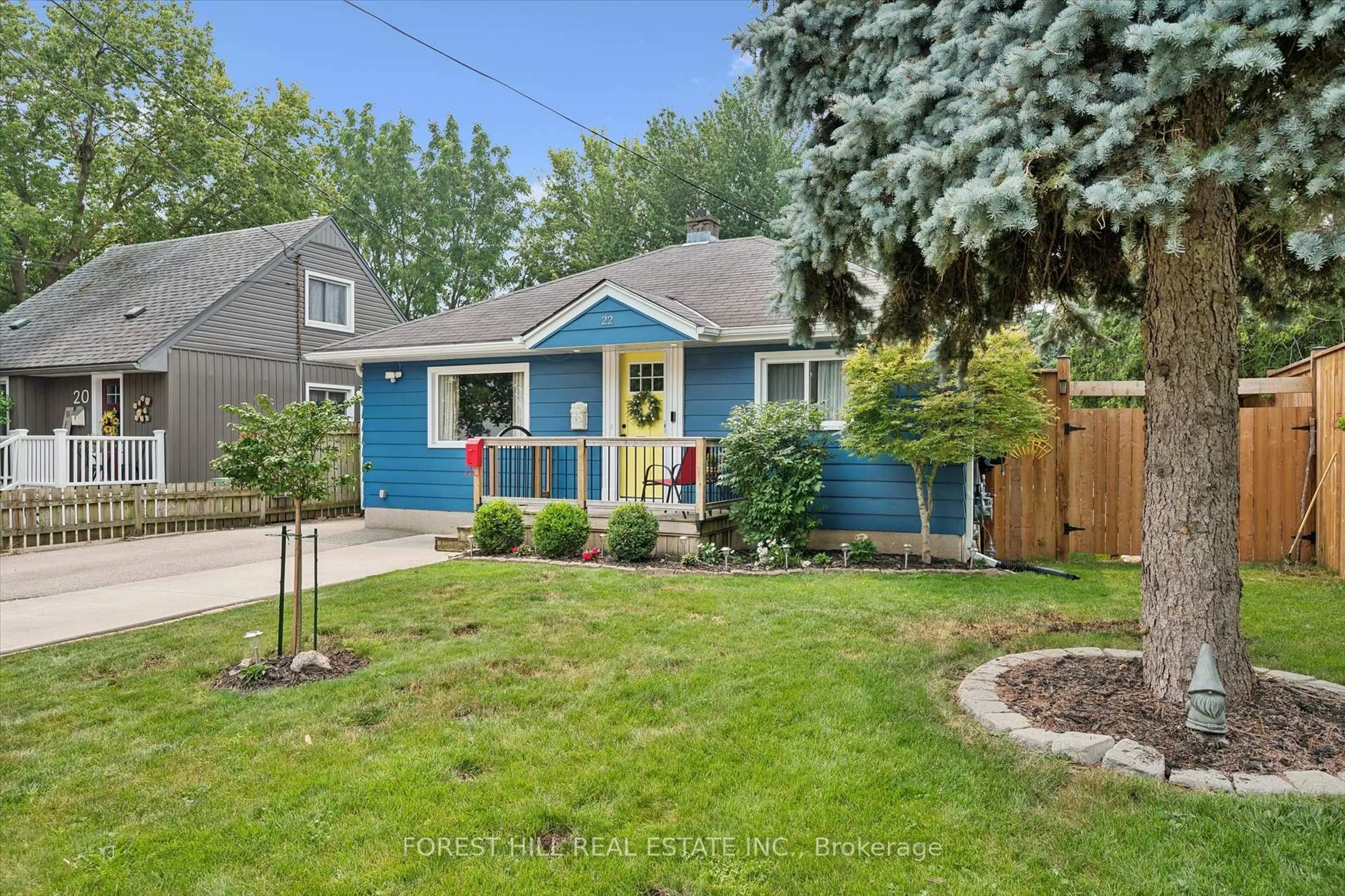 Home with vinyl exterior material, street for 22 Sleeman Ave, Guelph Ontario N1H 6E9