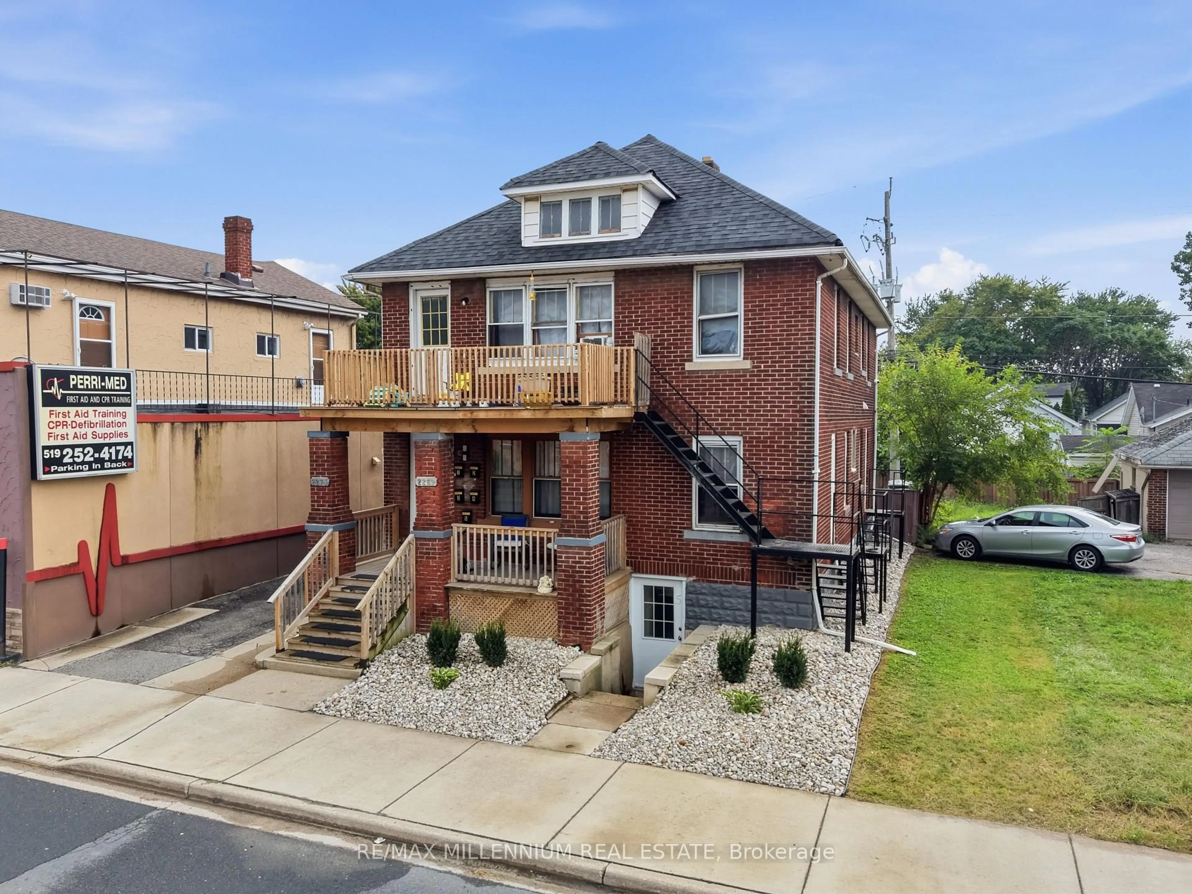 Home with brick exterior material, street for 2269-71 Howard Ave, Windsor Ontario N8X 3V2