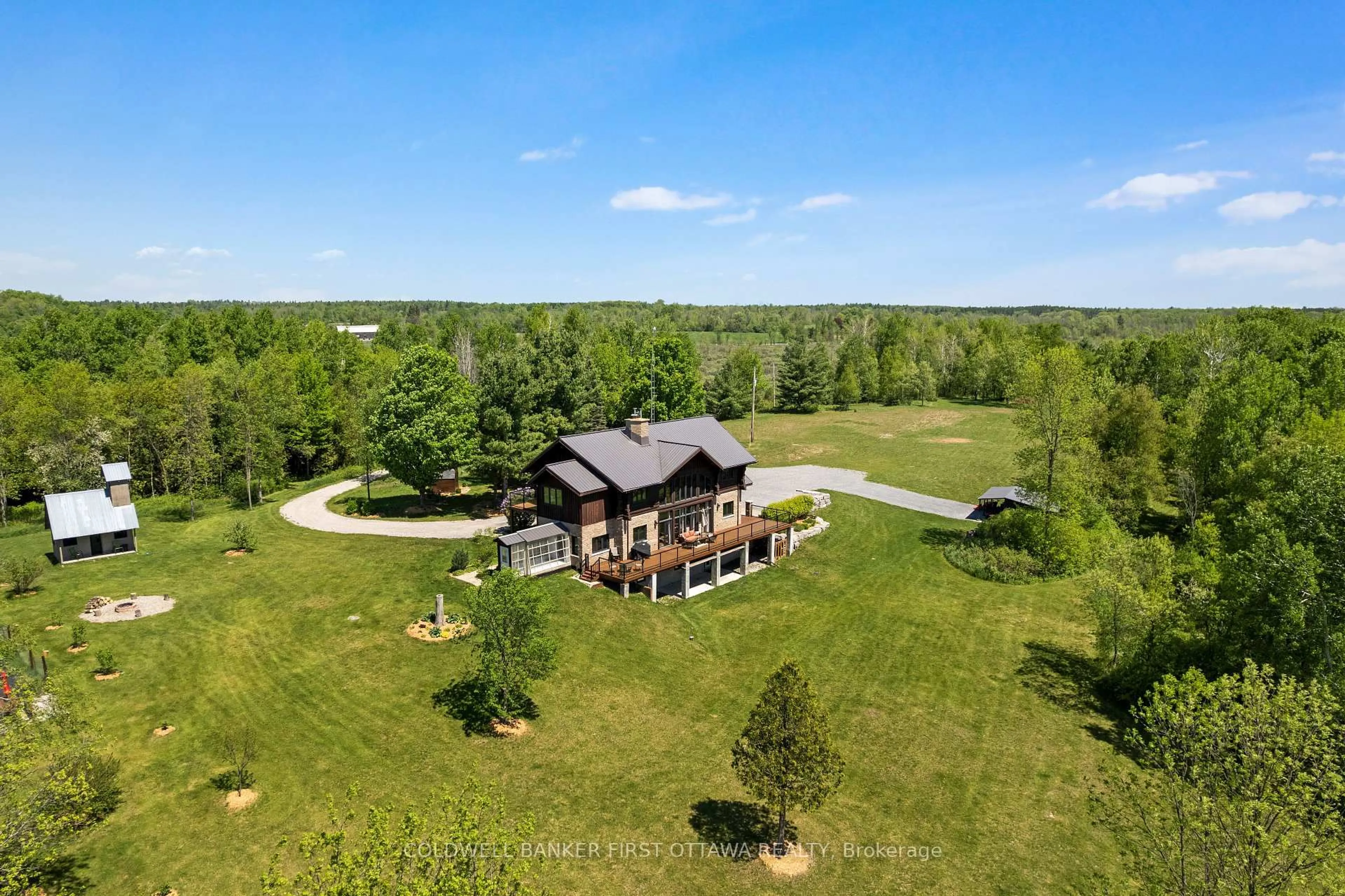 A pic from outside/outdoor area/front of a property/back of a property/a pic from drone, water/lake/river/ocean view for 19067 Highway 7, Perth Ontario K7H 3C6