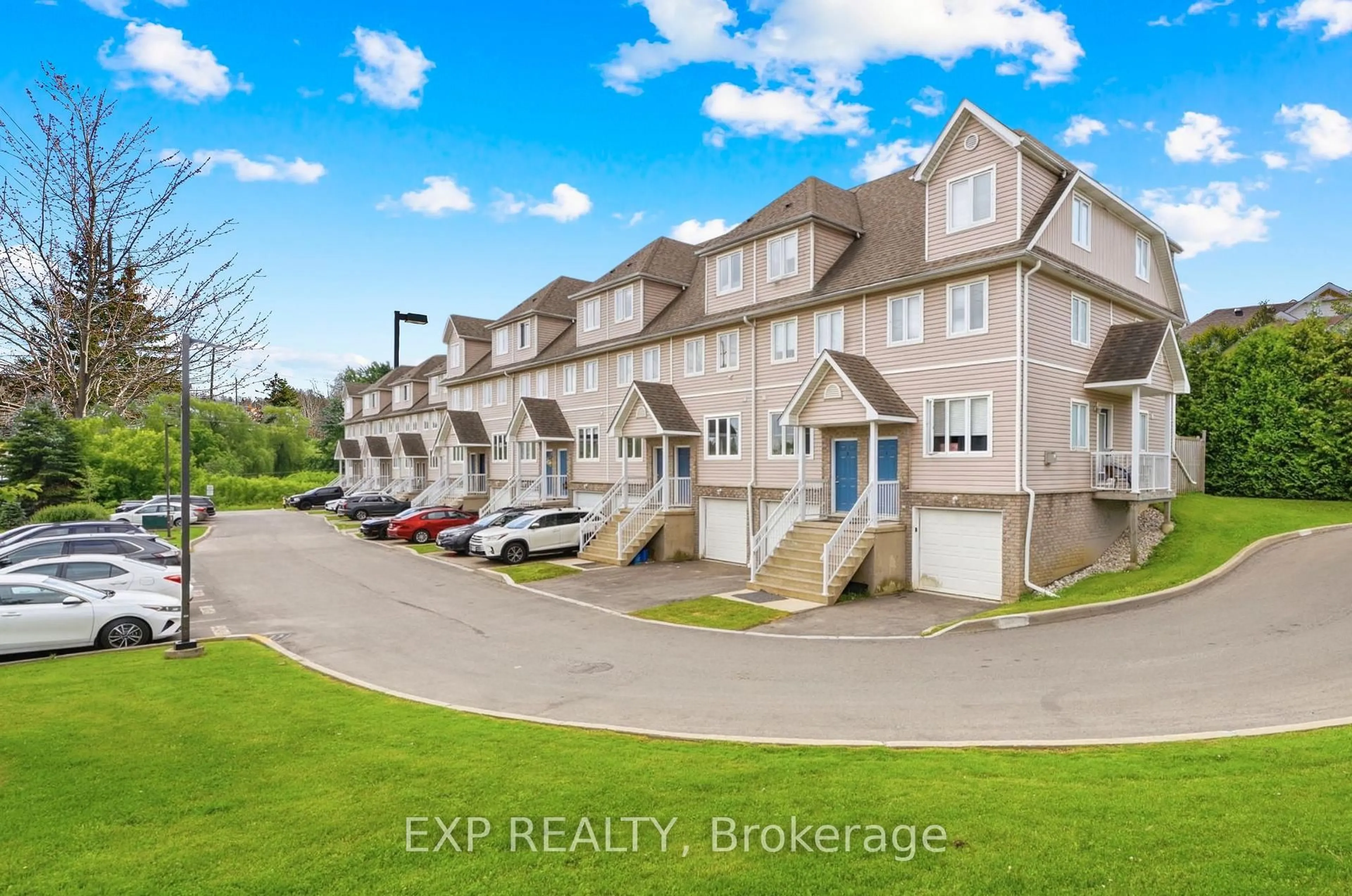 A pic from outside/outdoor area/front of a property/back of a property/a pic from drone, unknown for 601 Columbia Forest Blvd #3, Waterloo Ontario N2V 2K7