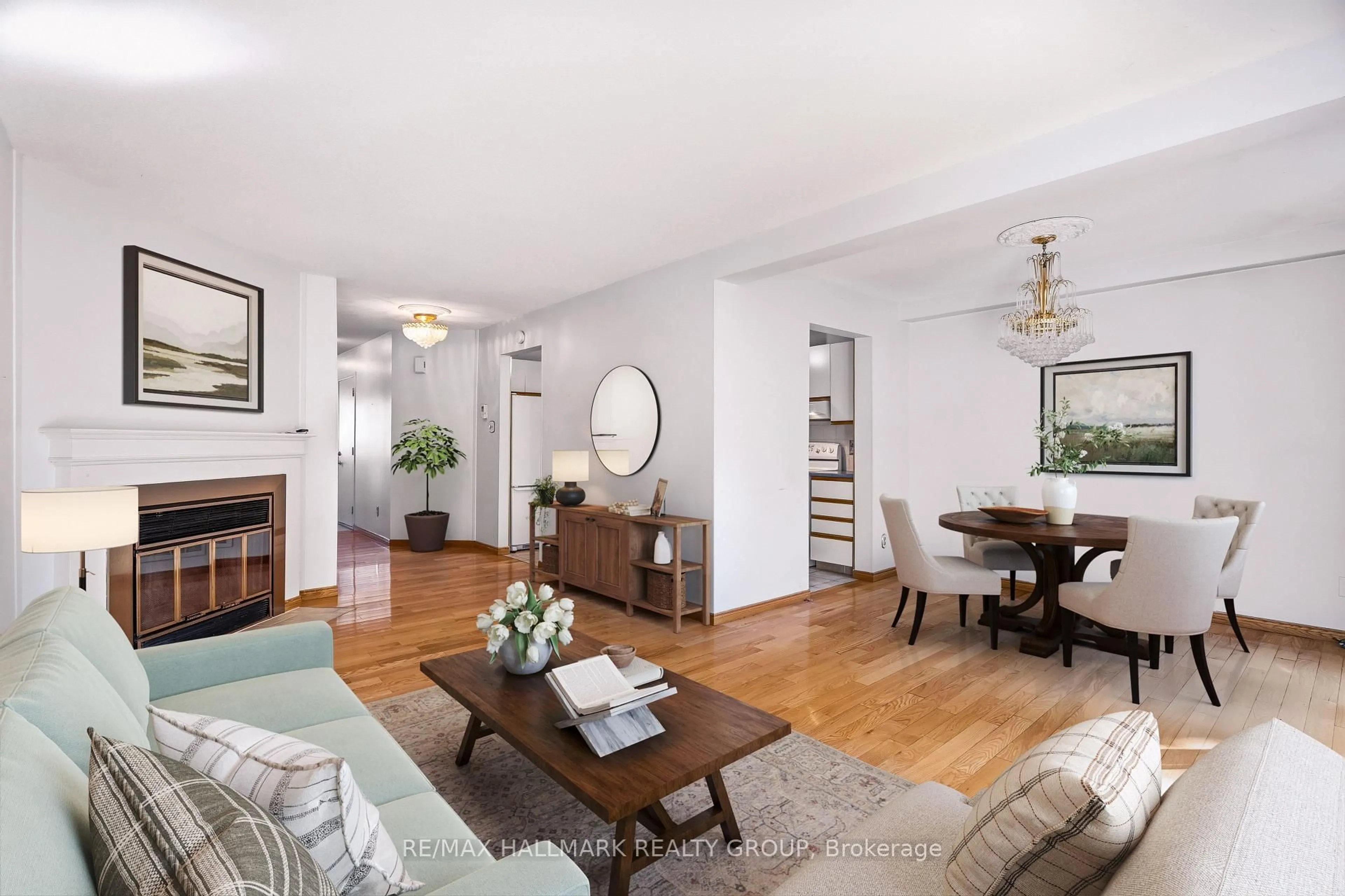 Living room with furniture, wood/laminate floor for 154 Presland Rd, Ottawa Ontario K1K 4J7
