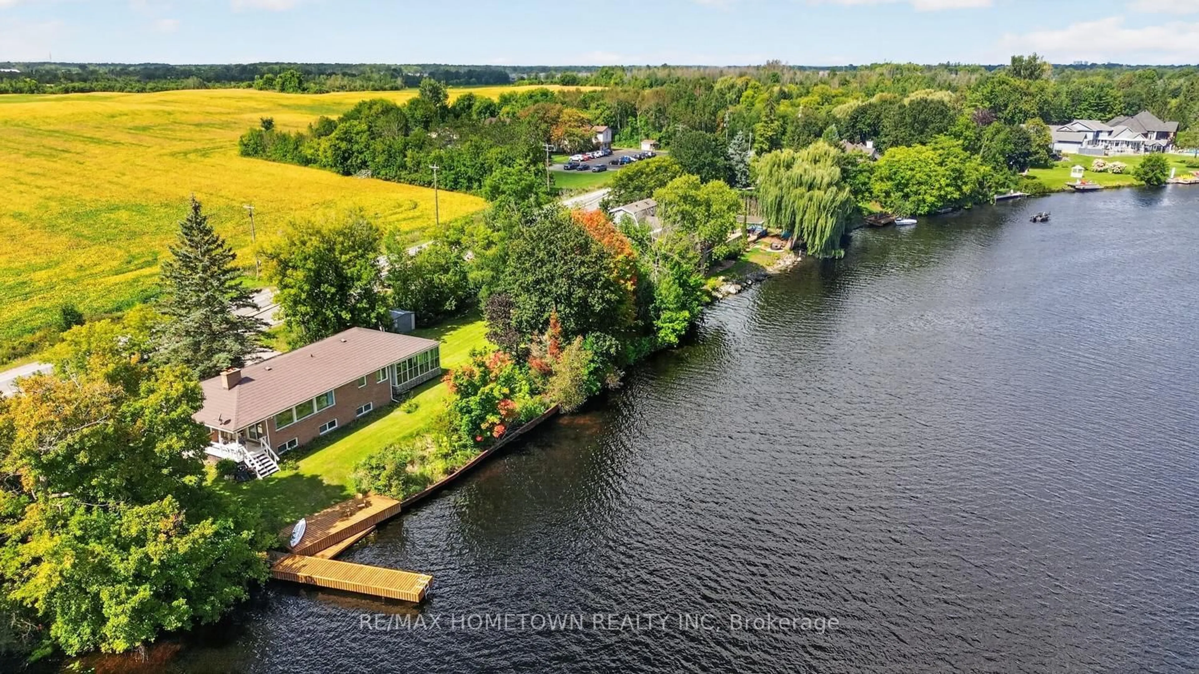 A pic from outside/outdoor area/front of a property/back of a property/a pic from drone, water/lake/river/ocean view for 5873 Rideau Valley Dr, Manotick Ontario K4M 1B3