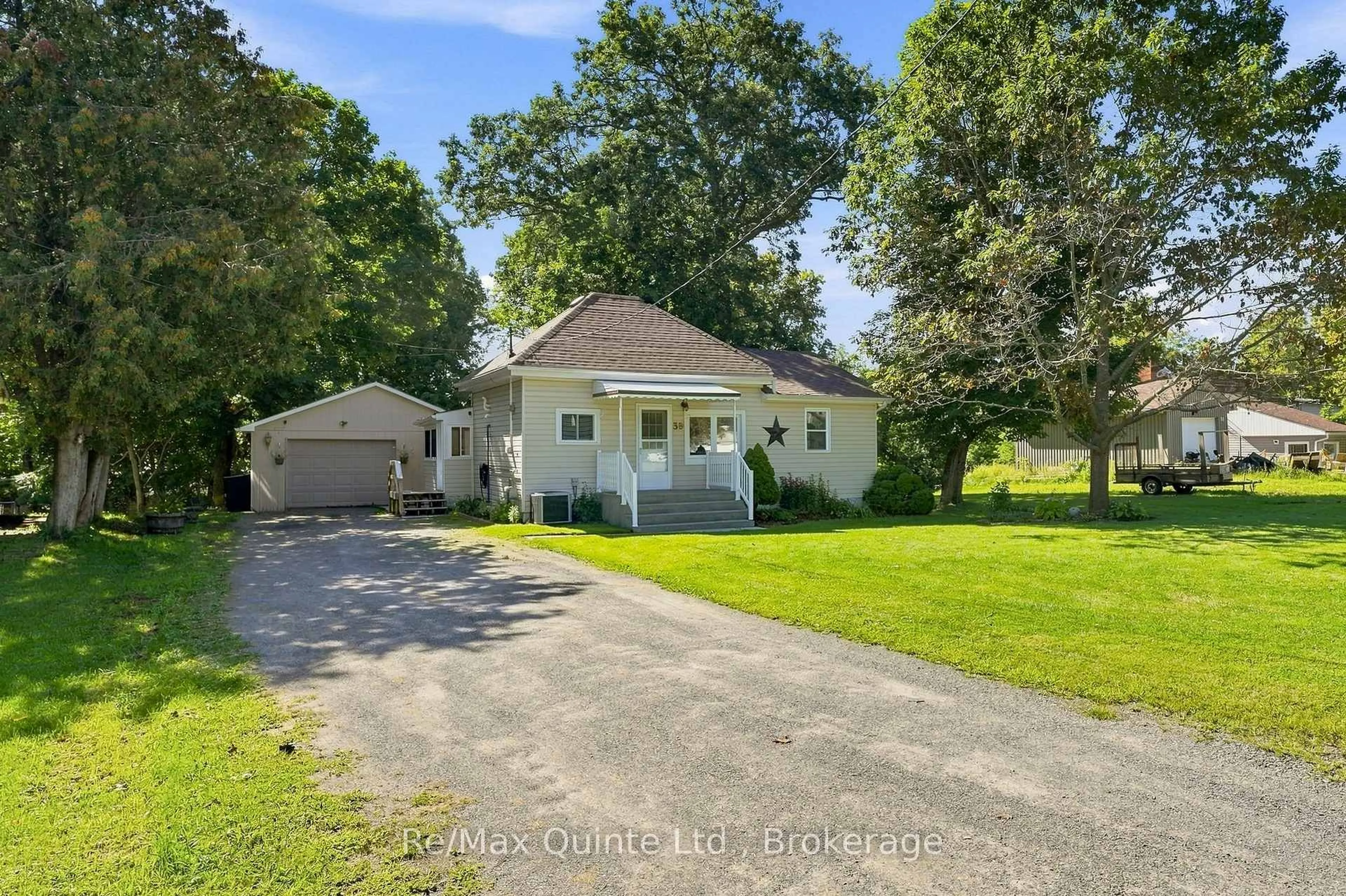 A pic from outside/outdoor area/front of a property/back of a property/a pic from drone, street for 38 Madoc St, Limoges Ontario K0K 2M0