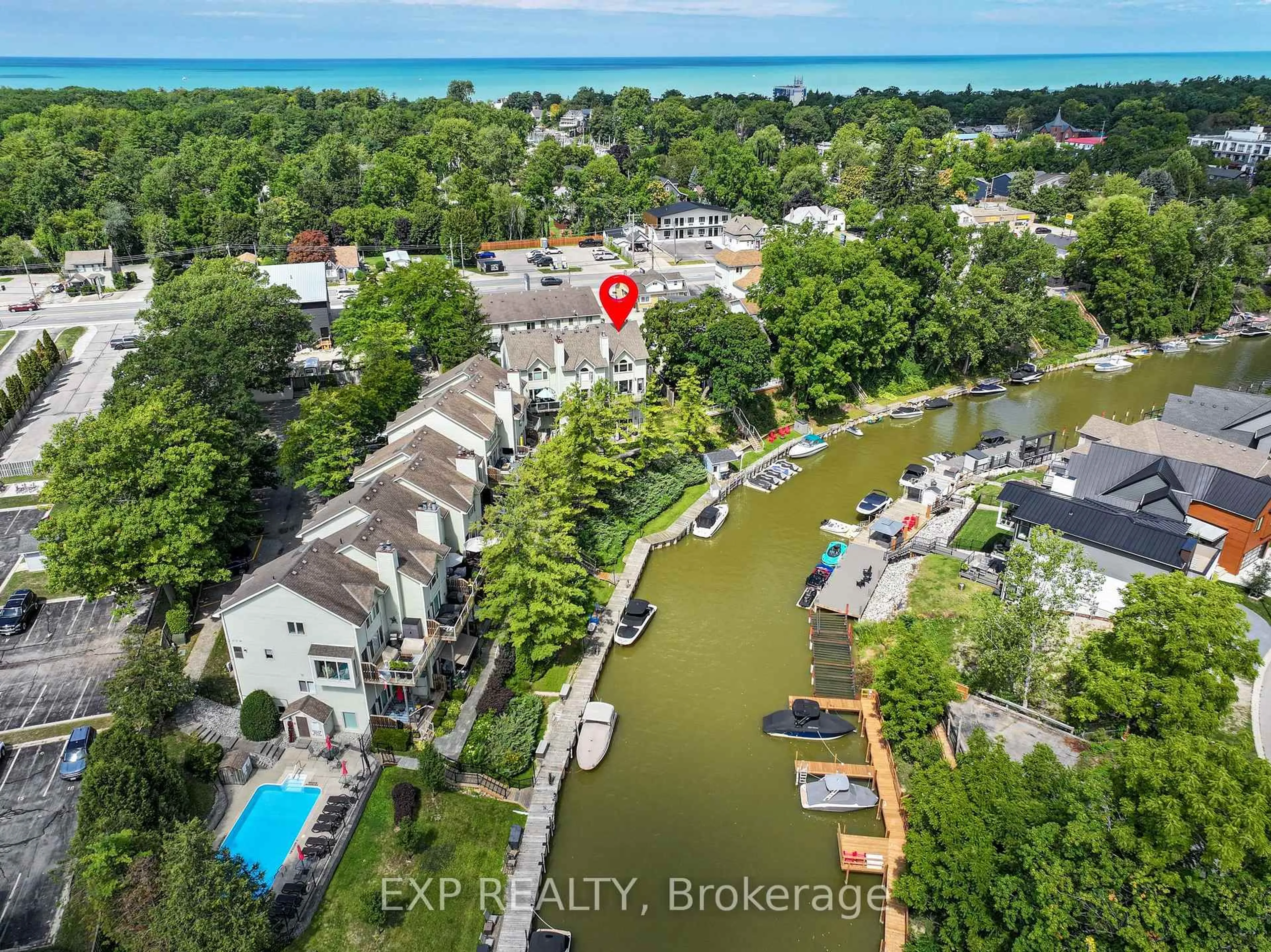 A pic from outside/outdoor area/front of a property/back of a property/a pic from drone, water/lake/river/ocean view for 40 Ontario St #4, Lambton Shores Ontario N0M 1T0