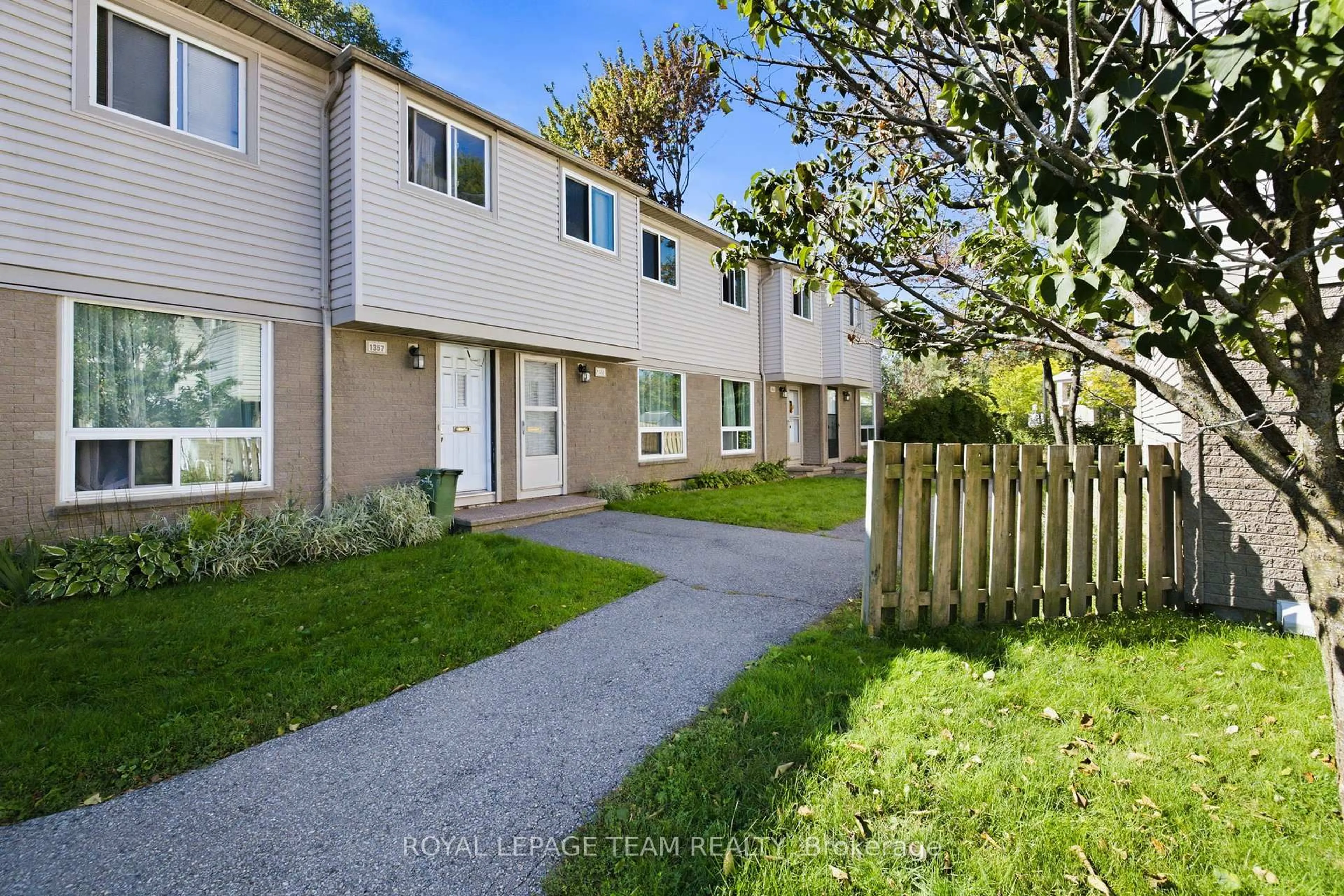 A pic from outside/outdoor area/front of a property/back of a property/a pic from drone, street for 1355 Perez Cres #63, Ottawa Ontario K1J 8T9