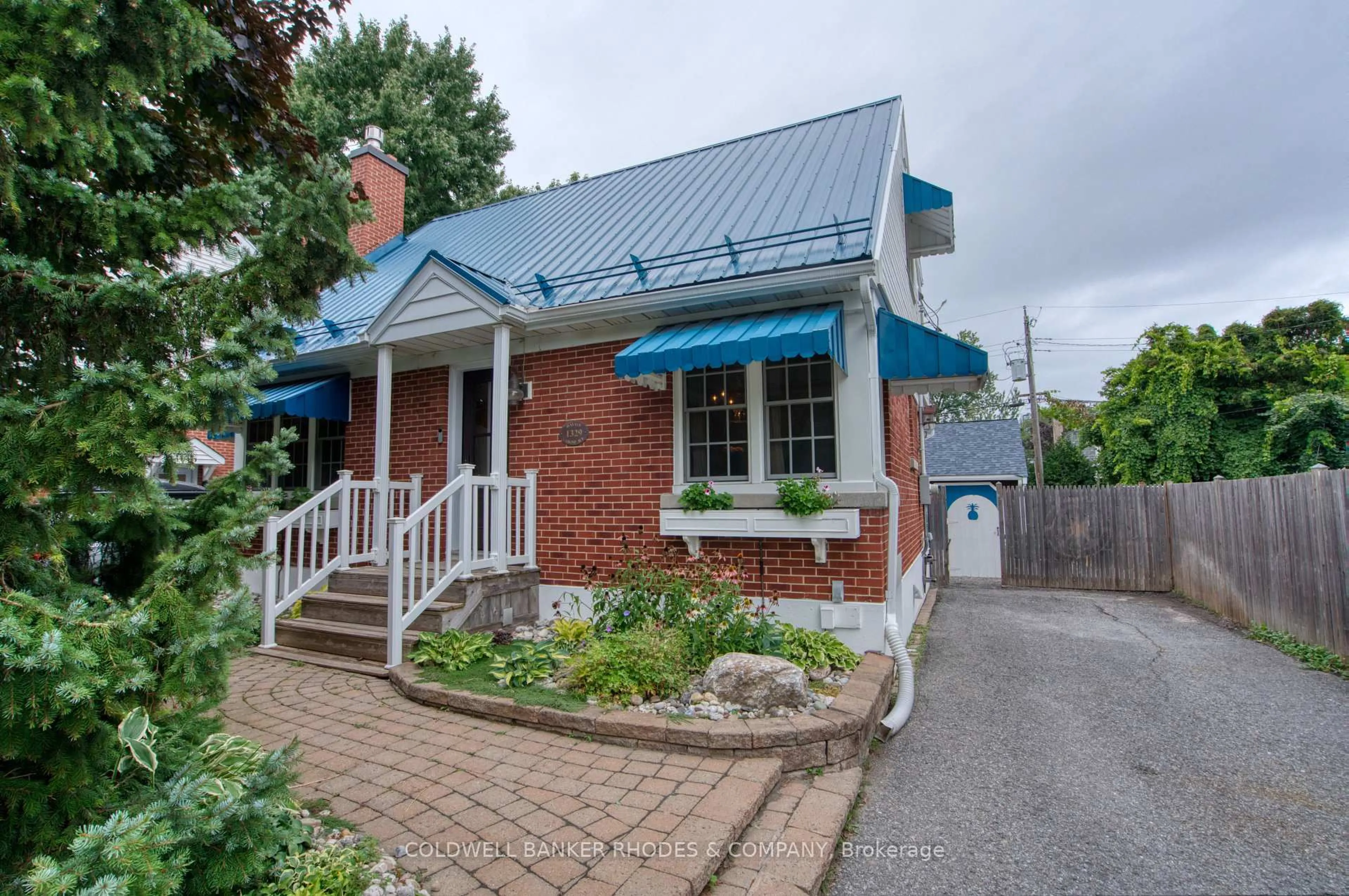 Home with brick exterior material, street for 1329 Larose Ave, Ottawa Ontario K1Z 7X4