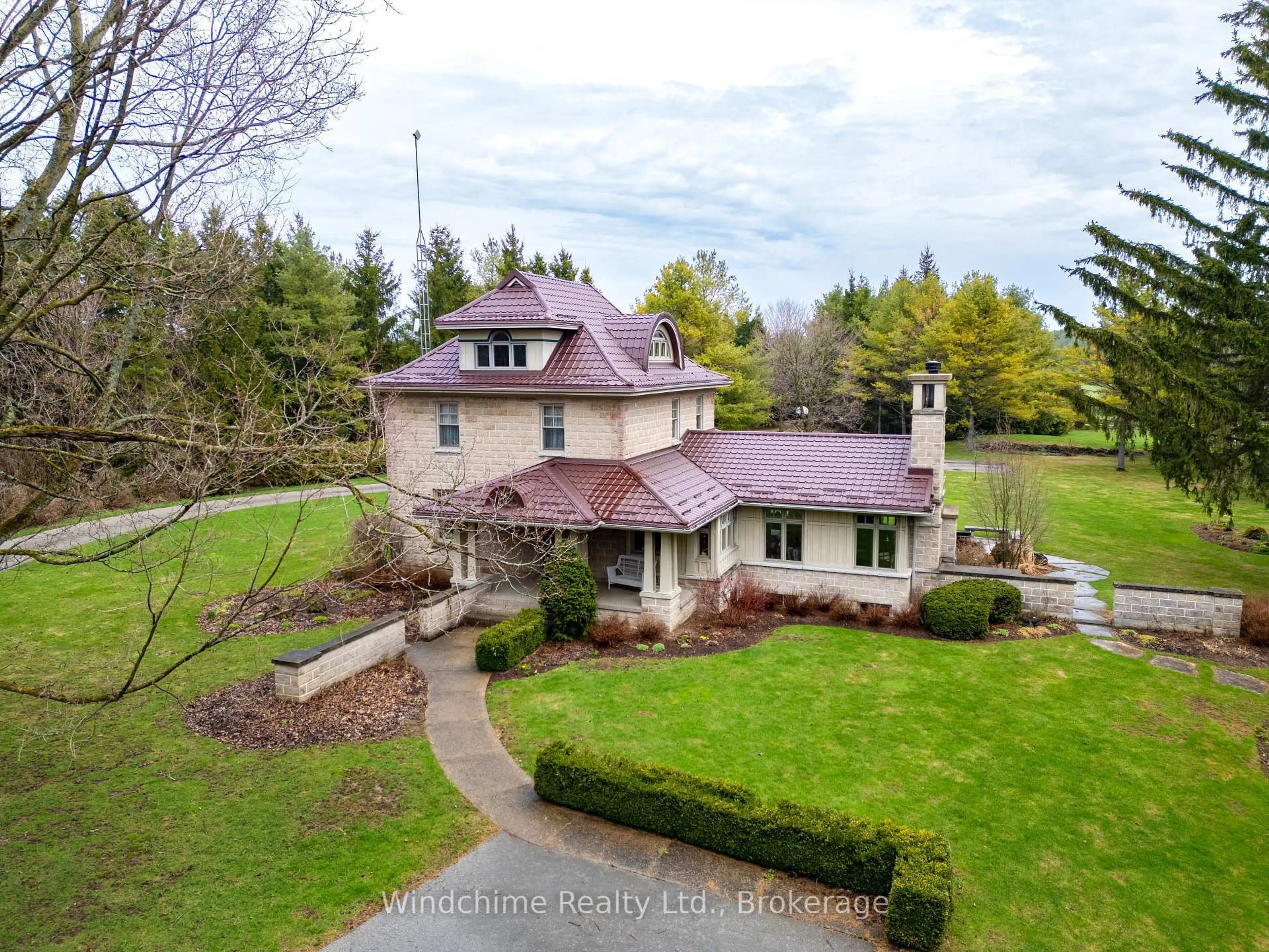 A pic from outside/outdoor area/front of a property/back of a property/a pic from drone, street for 635317 Euphrasia-Holland Townline, Grey Highlands Ontario N0C 1H0