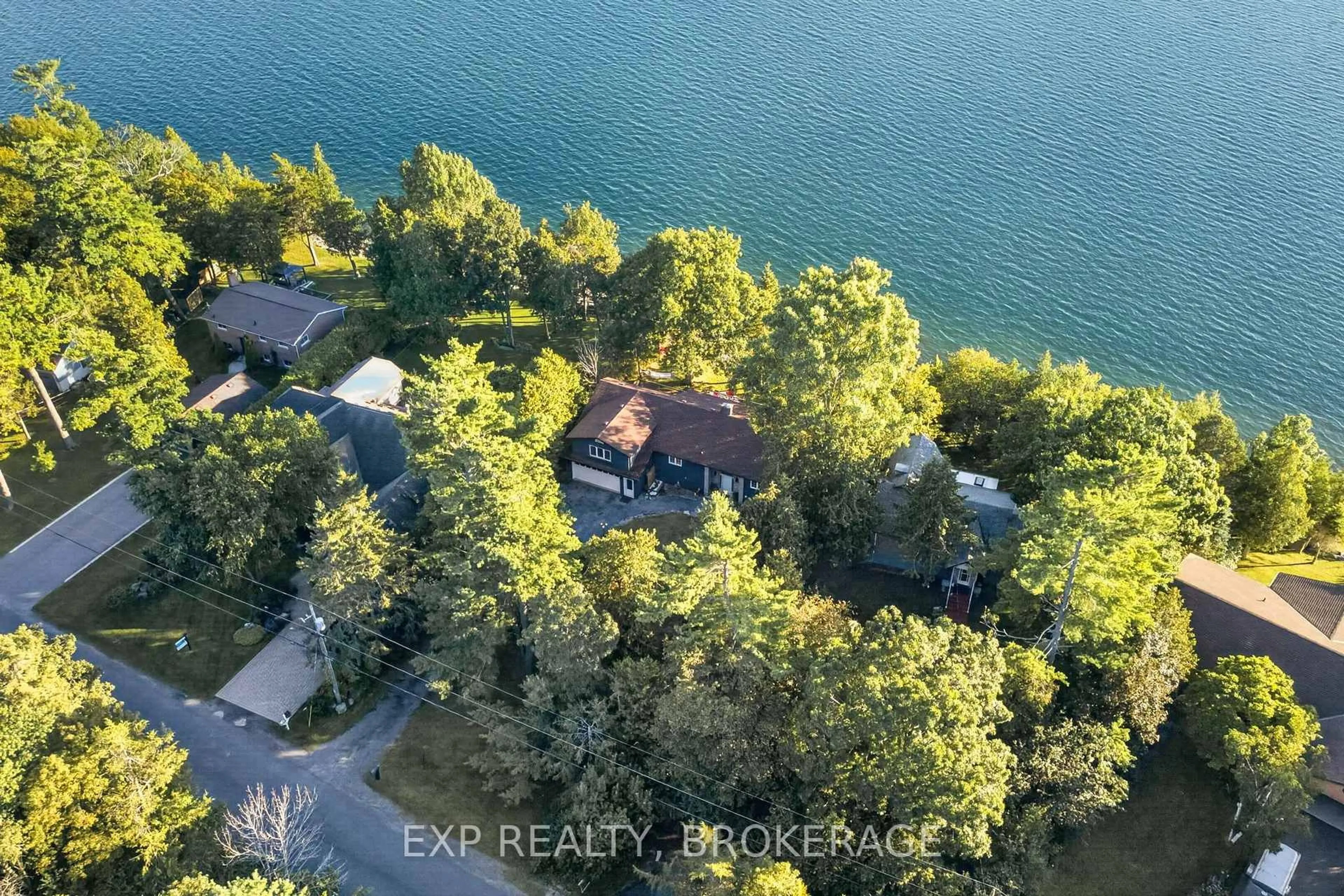 A pic from outside/outdoor area/front of a property/back of a property/a pic from drone, water/lake/river/ocean view for 182 Nicholson Point Rd, Bath Ontario K0H 1G0