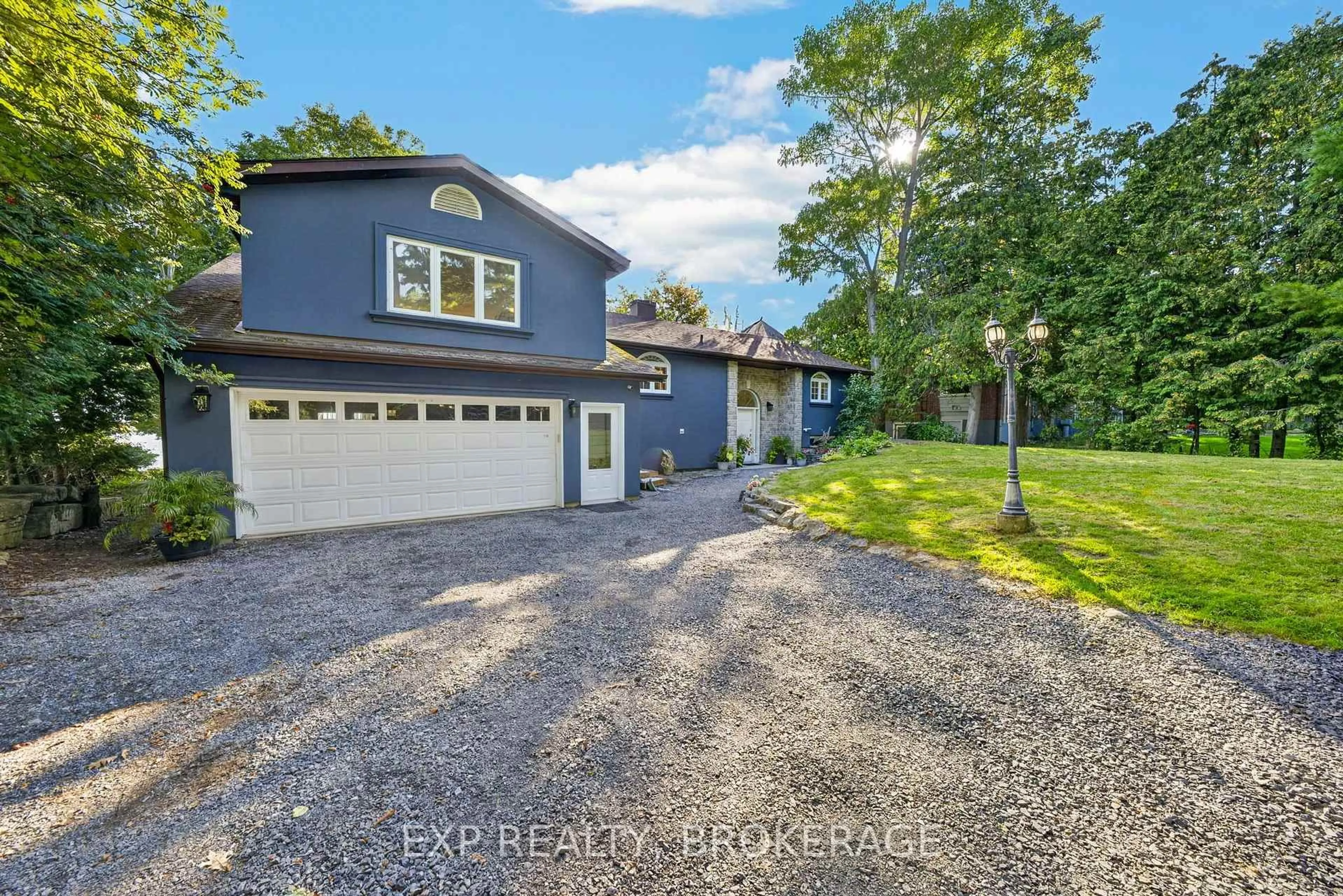 A pic from outside/outdoor area/front of a property/back of a property/a pic from drone, street for 182 Nicholson Point Rd, Bath Ontario K0H 1G0