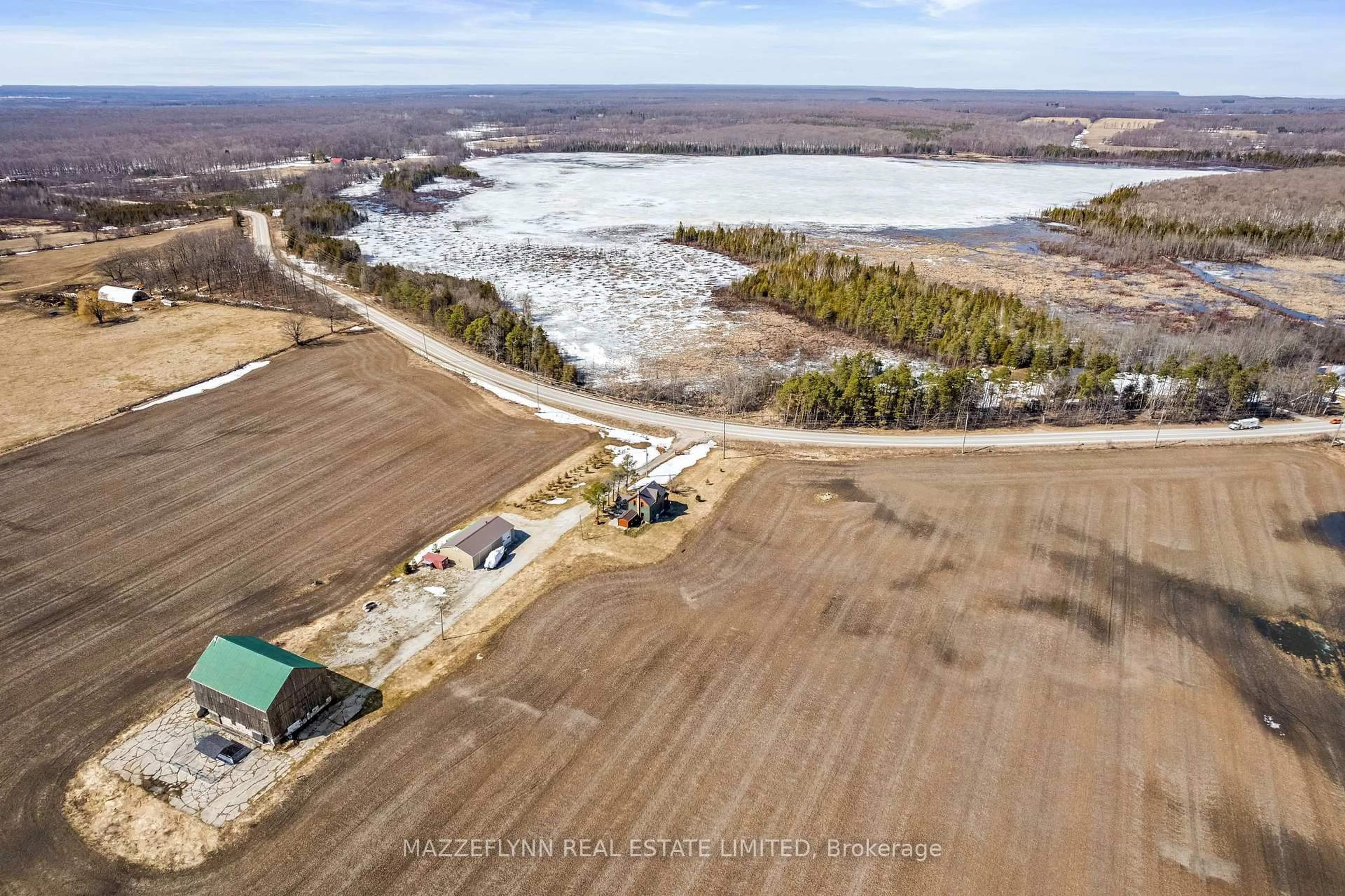 A pic from outside/outdoor area/front of a property/back of a property/a pic from drone, water/lake/river/ocean view for 402558 Grey Road 17 Rd, Georgian Bluffs Ontario N0H 2T0