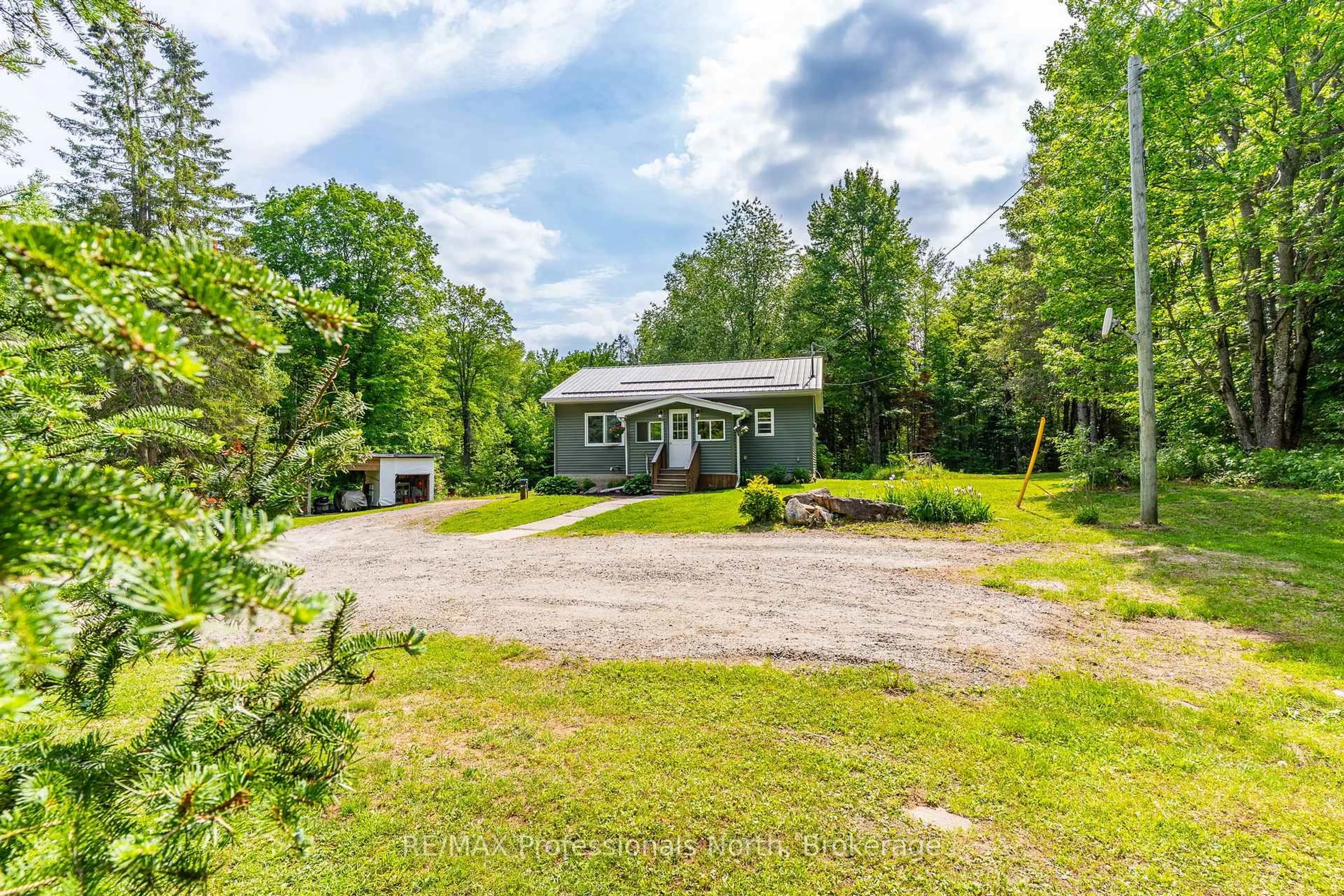 A pic from outside/outdoor area/front of a property/back of a property/a pic from drone, unknown for 17900 Highway 118, Highlands East Ontario K0L 2Y0