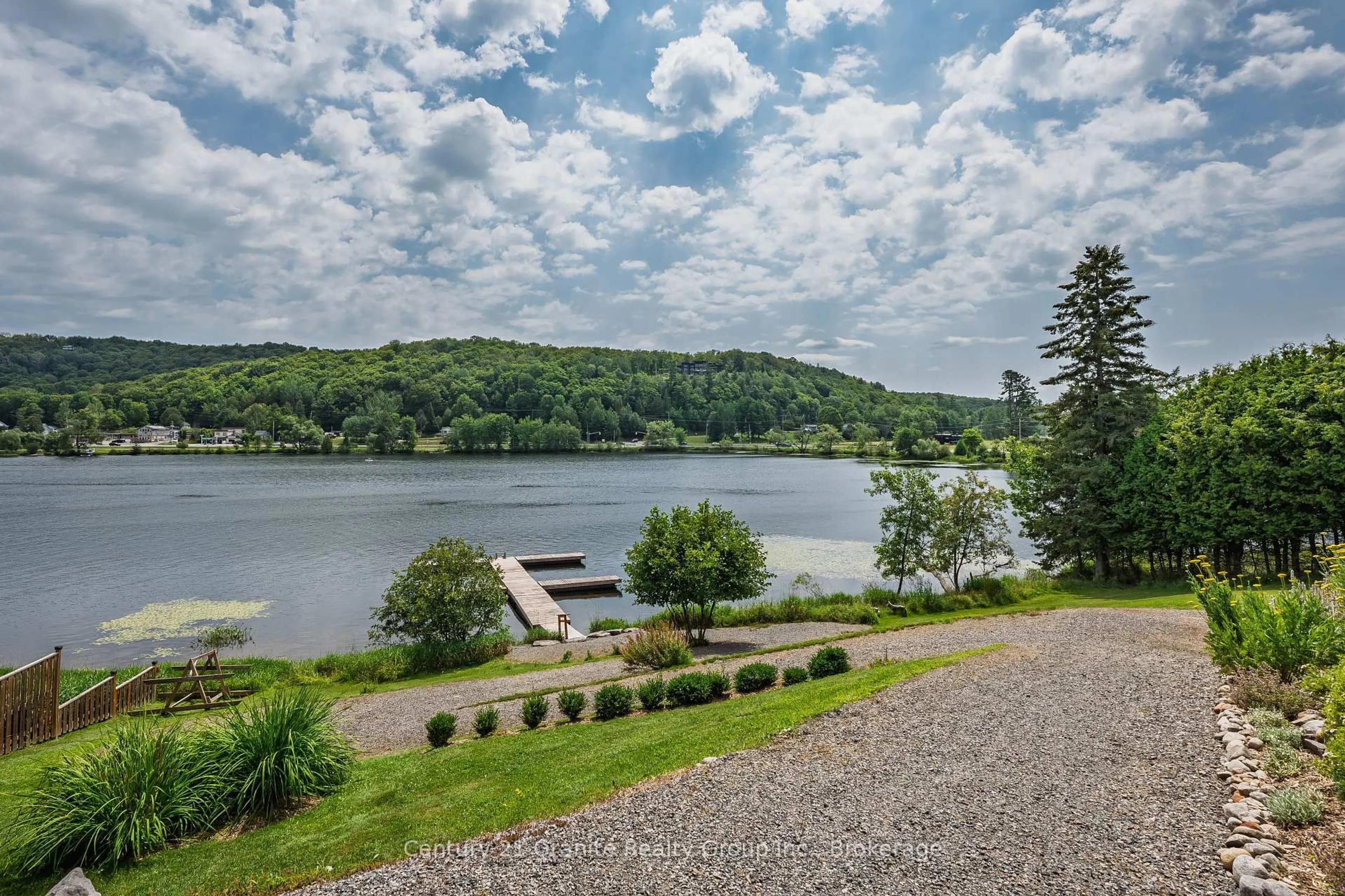 A pic from outside/outdoor area/front of a property/back of a property/a pic from drone, water/lake/river/ocean view for 75 Wallings Rd #105, Dysart et al Ontario K0M 1S0