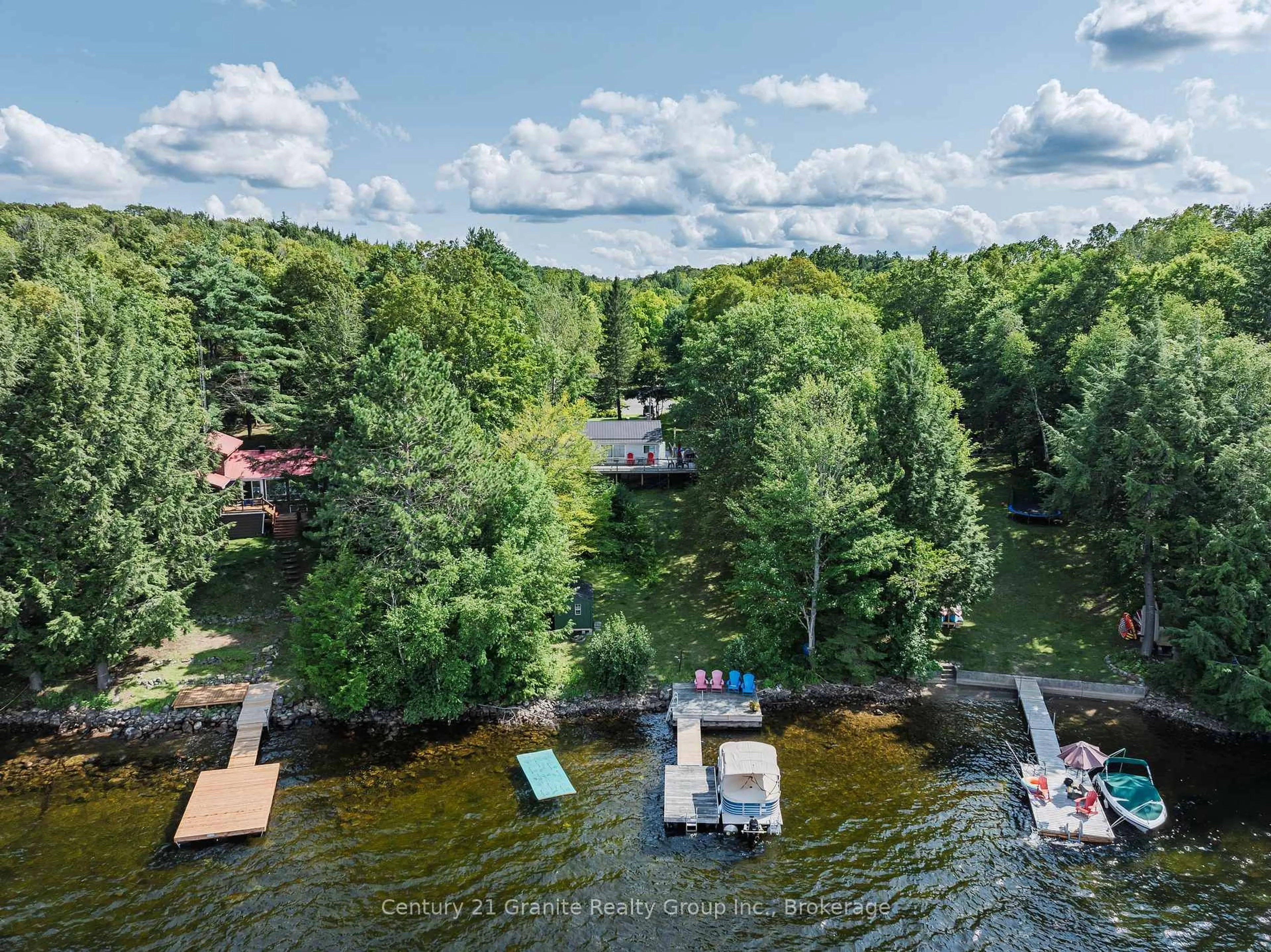 A pic from outside/outdoor area/front of a property/back of a property/a pic from drone, water/lake/river/ocean view for 1401 Hodgson Rd, Dysart et al Ontario K0M 1S0