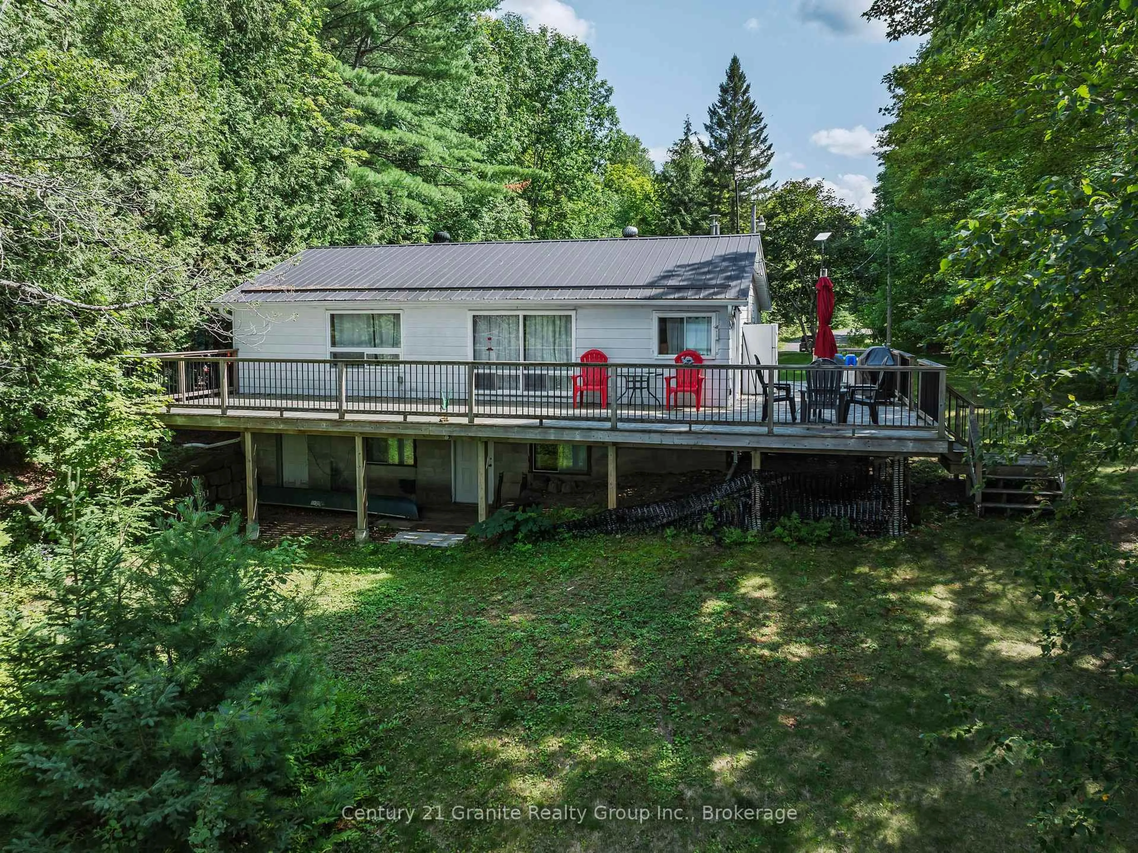 A pic from outside/outdoor area/front of a property/back of a property/a pic from drone, water/lake/river/ocean view for 1401 Hodgson Rd, Dysart et al Ontario K0M 1S0