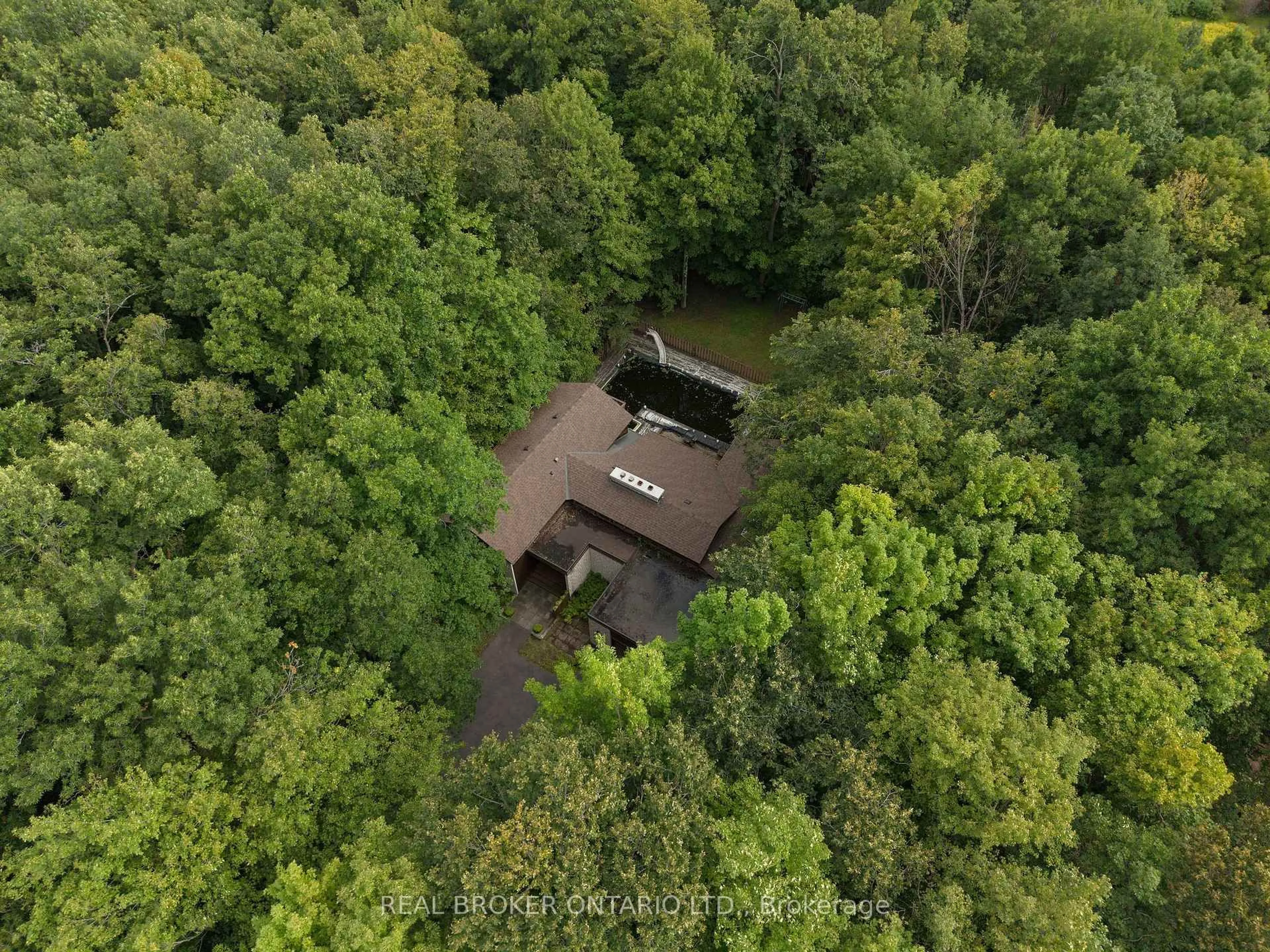 A pic from outside/outdoor area/front of a property/back of a property/a pic from drone, forest/trees view for 2316 French Hill Rd, Ottawa Ontario K4C 1M2