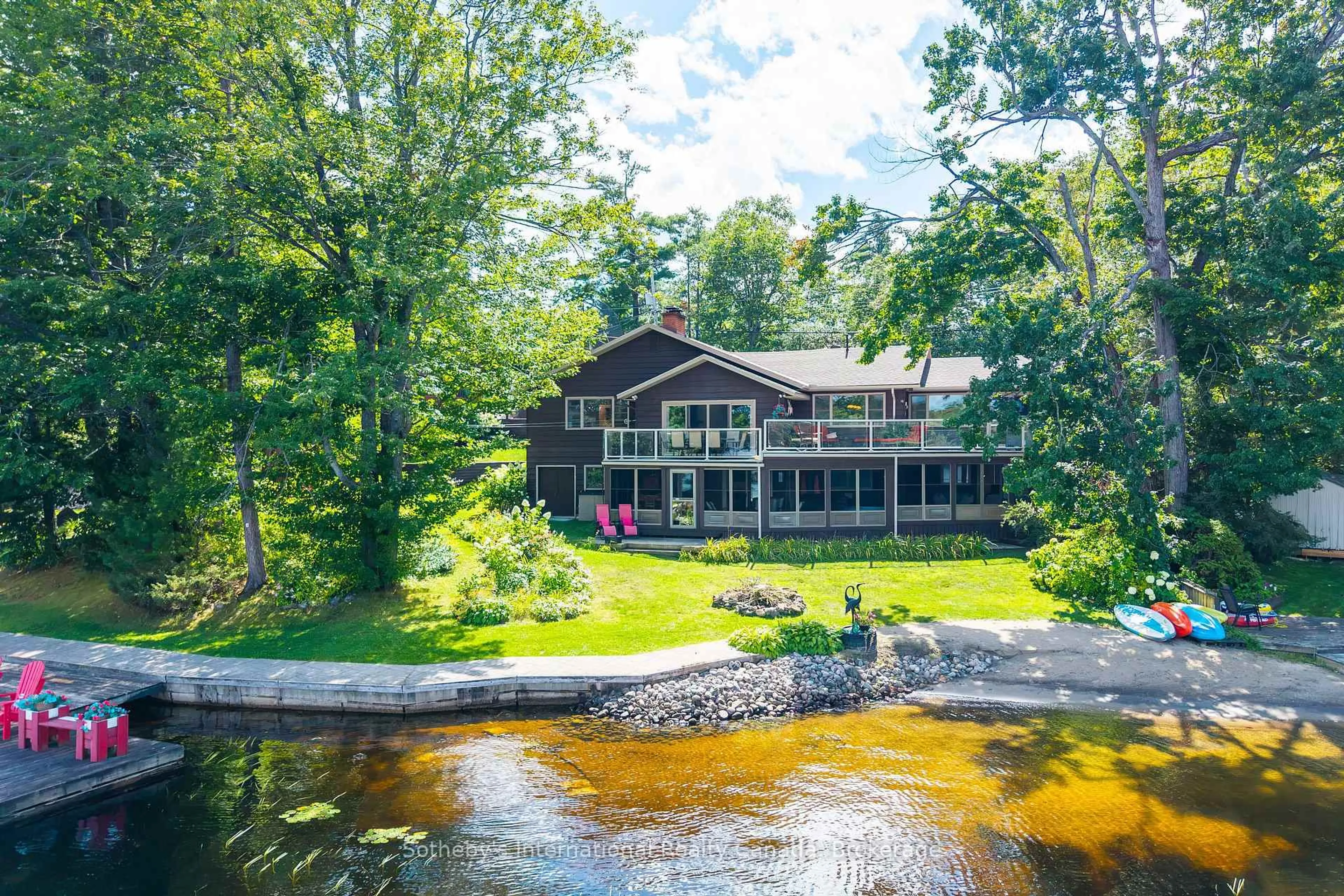 A pic from outside/outdoor area/front of a property/back of a property/a pic from drone, water/lake/river/ocean view for 1240 North Kahshe Lake Rd #2, Gravenhurst Ontario P0G 1E0