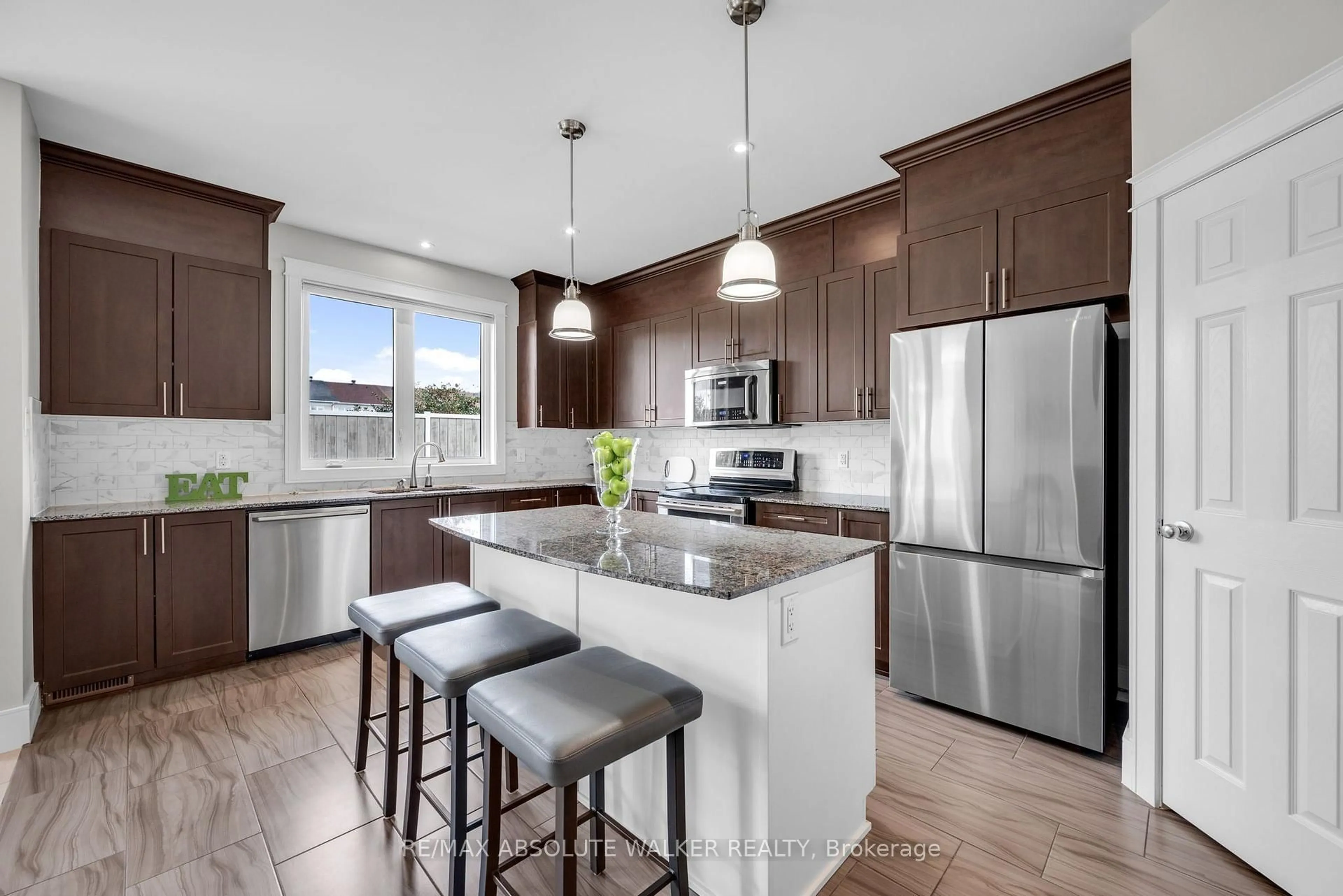 Open concept kitchen, ceramic/tile floor for 355 Nestleton St, Ottawa Ontario K4A 0W2