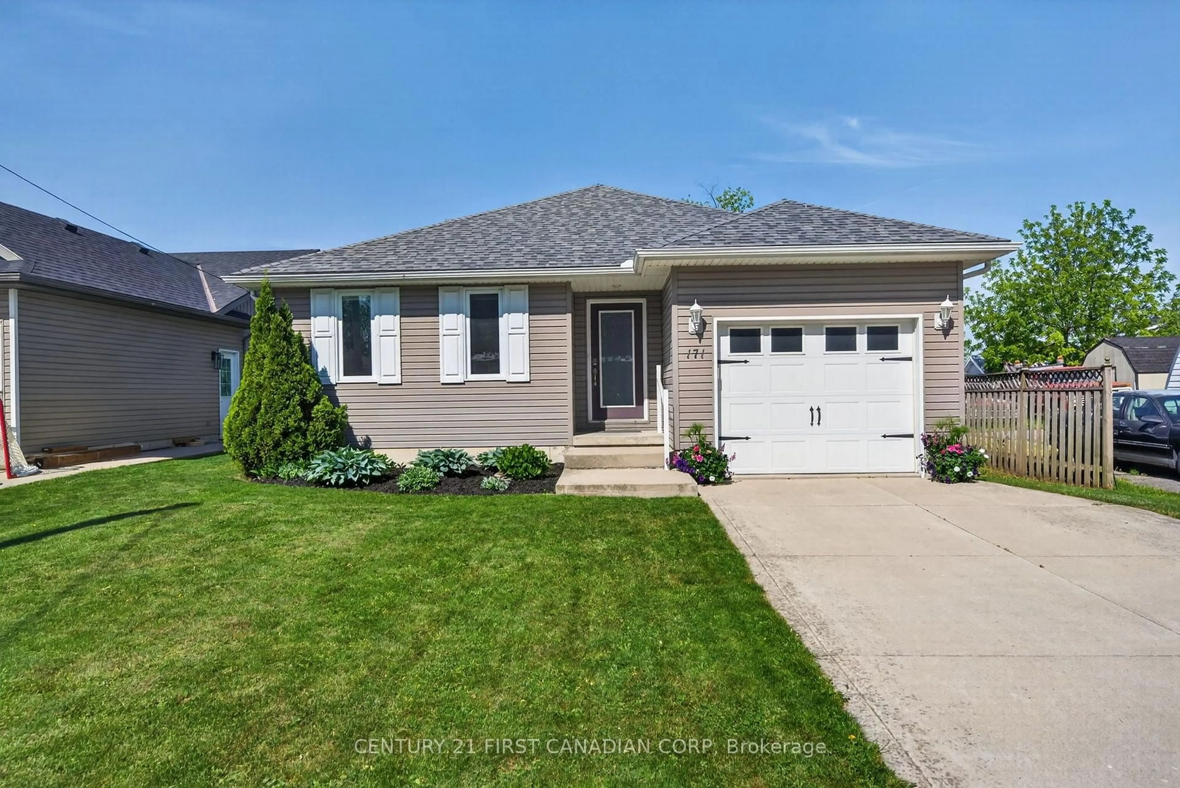 Home with vinyl exterior material, street for 171 Francis St, South Huron Ontario N0M 1S3