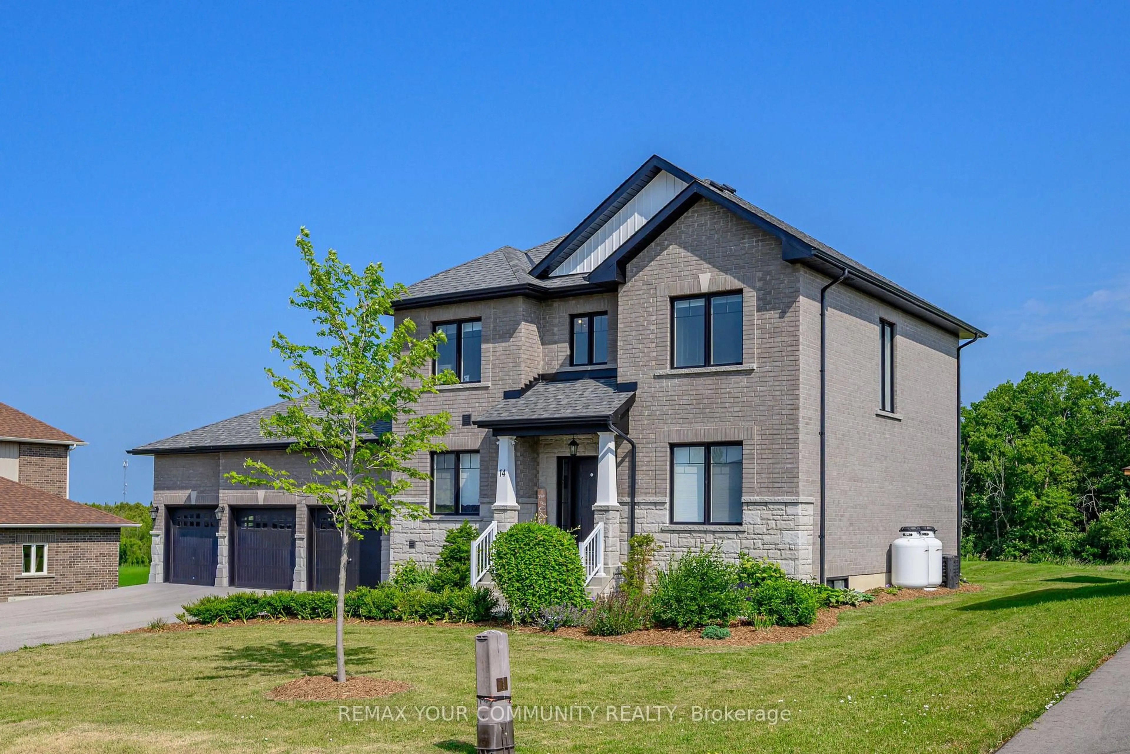 Home with brick exterior material, unknown for 14 McCrae Cres, Kawartha Lakes Ontario K0M 2T0