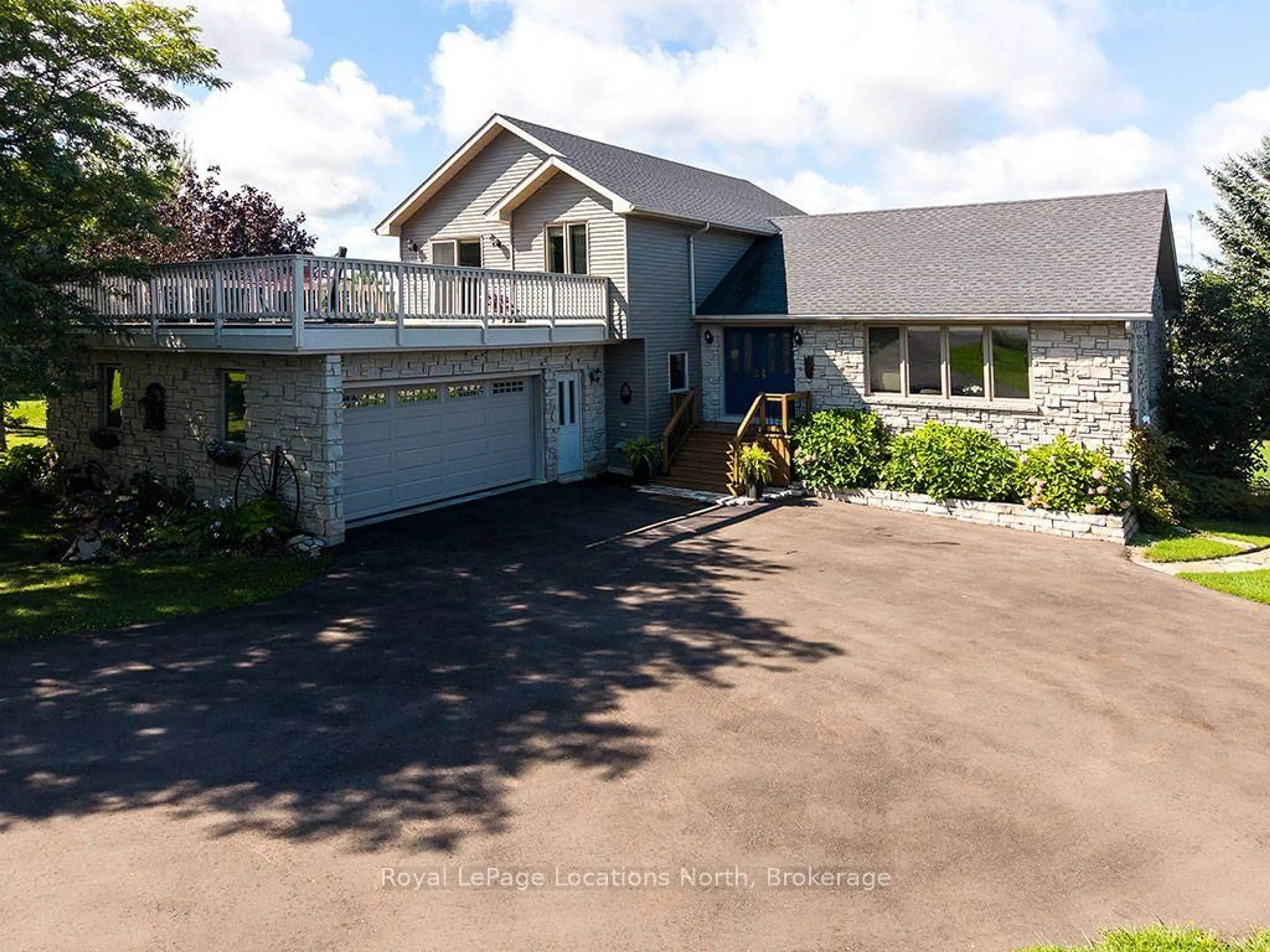 A pic from outside/outdoor area/front of a property/back of a property/a pic from drone, street for 317624 3rd Line, Meaford Ontario N4L 1W7