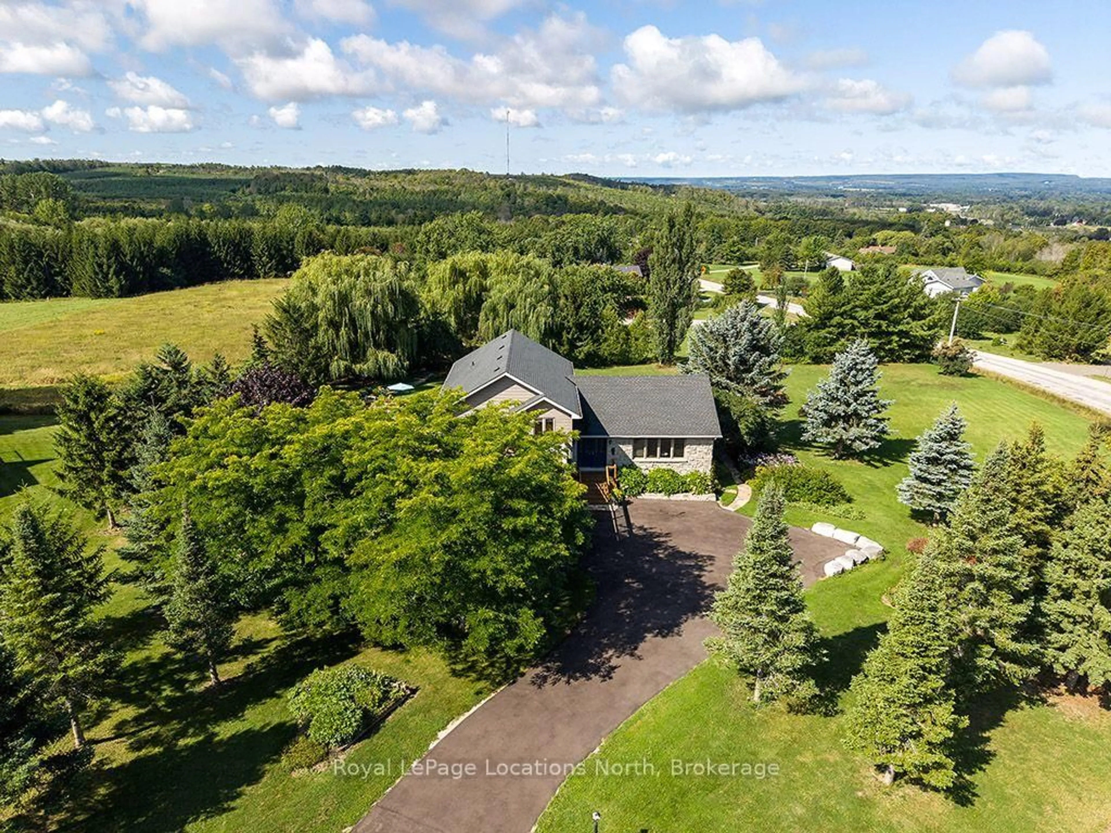 A pic from outside/outdoor area/front of a property/back of a property/a pic from drone, unknown for 317624 3rd Line, Meaford Ontario N4L 1W7