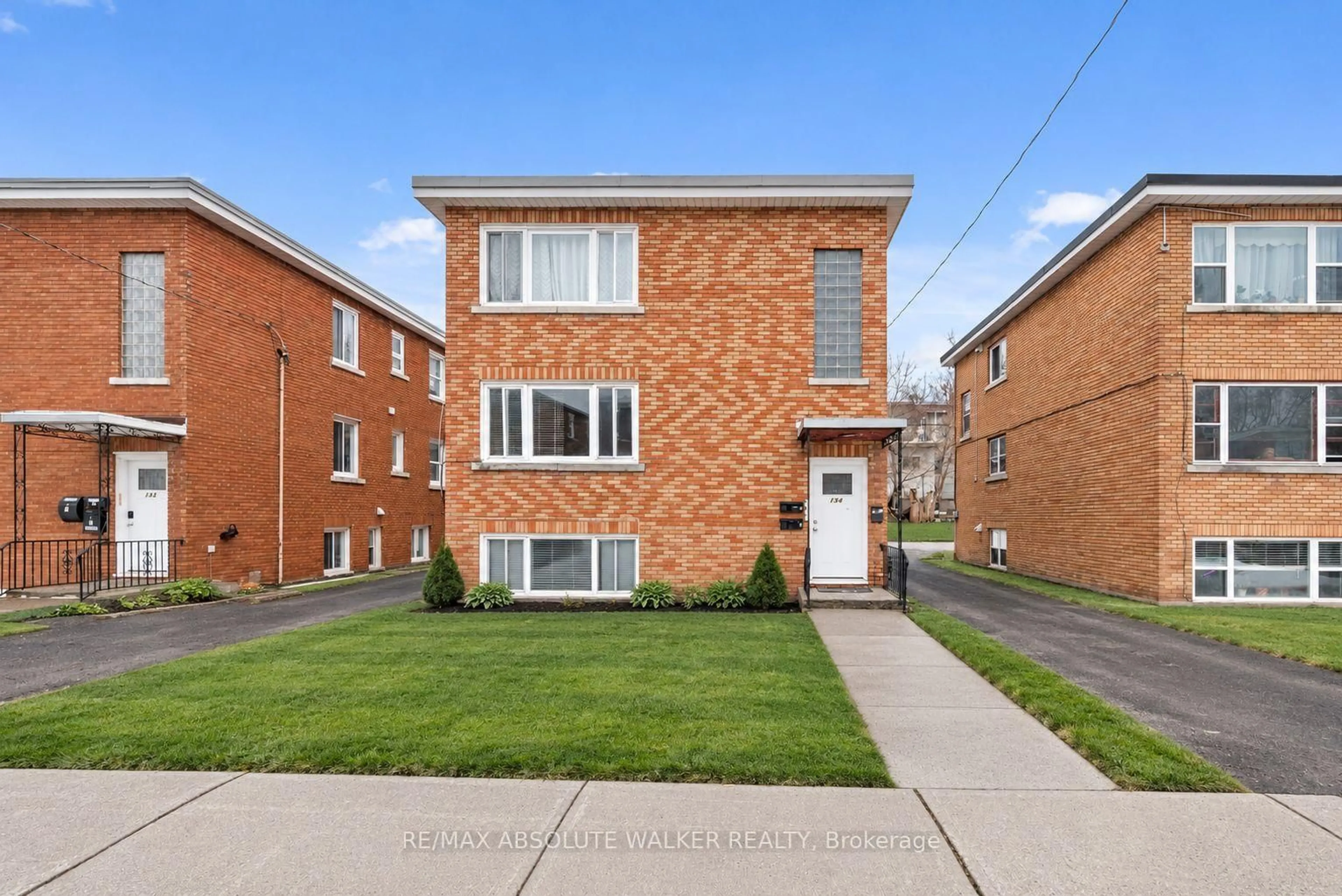 Home with brick exterior material, street for 134 Jolliet Ave, Ottawa Ontario K1L 5J7