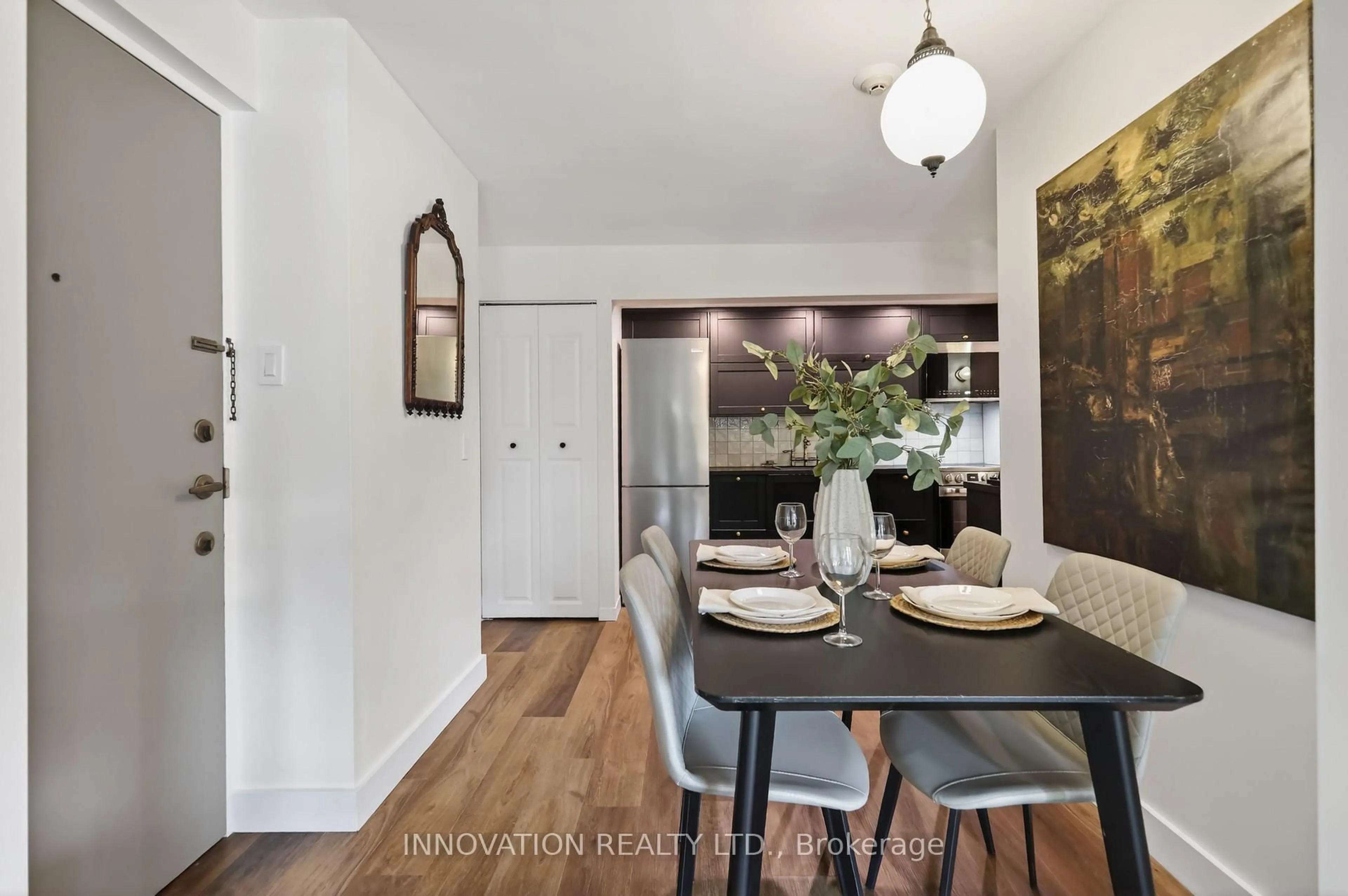 Dining room, wood/laminate floor for 110 Rideau Terr #1, Ottawa Ontario K1M 0Z2
