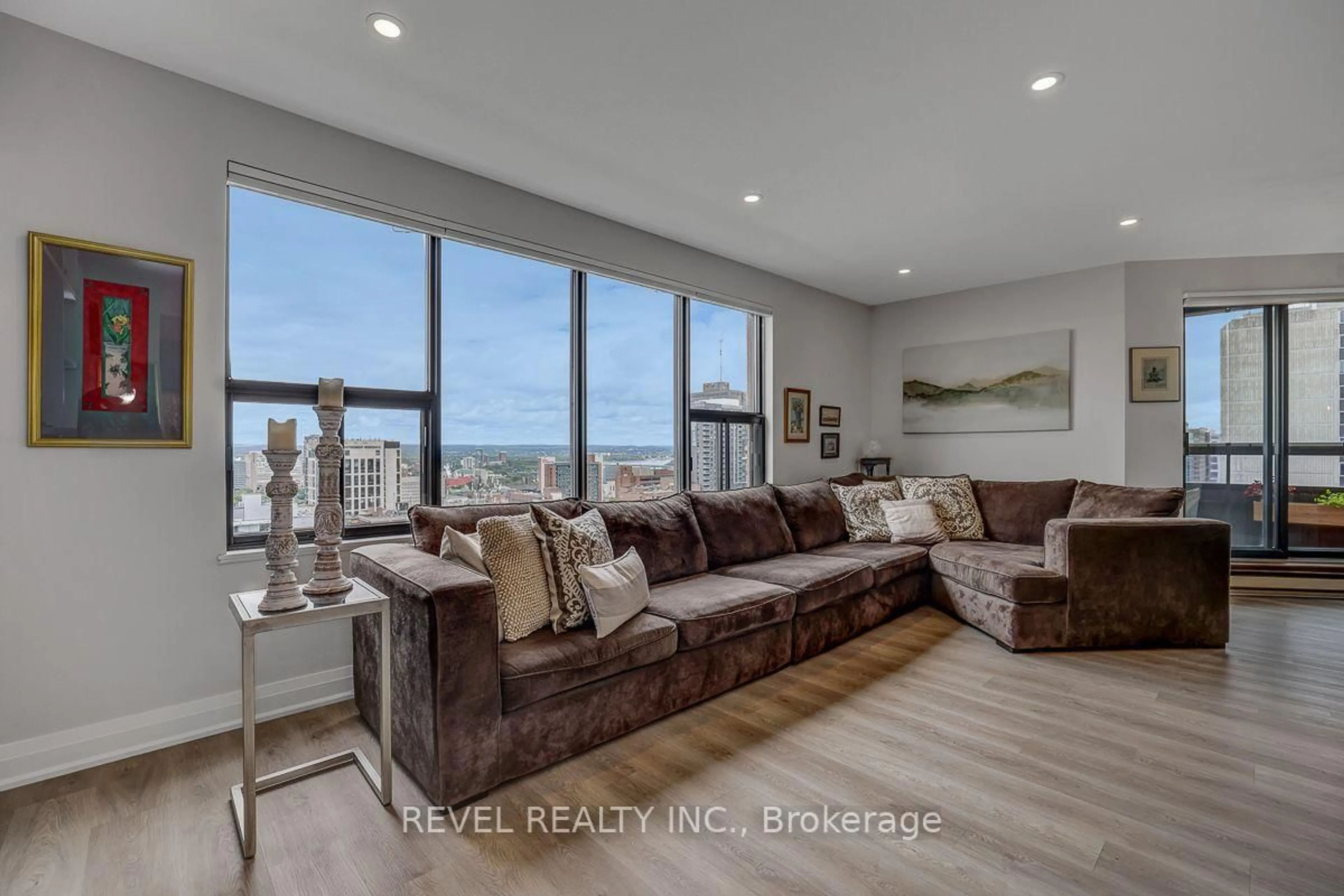 Living room with furniture, wood/laminate floor for 556 Laurier Ave #2003, Ottawa Ontario K1R 7X2