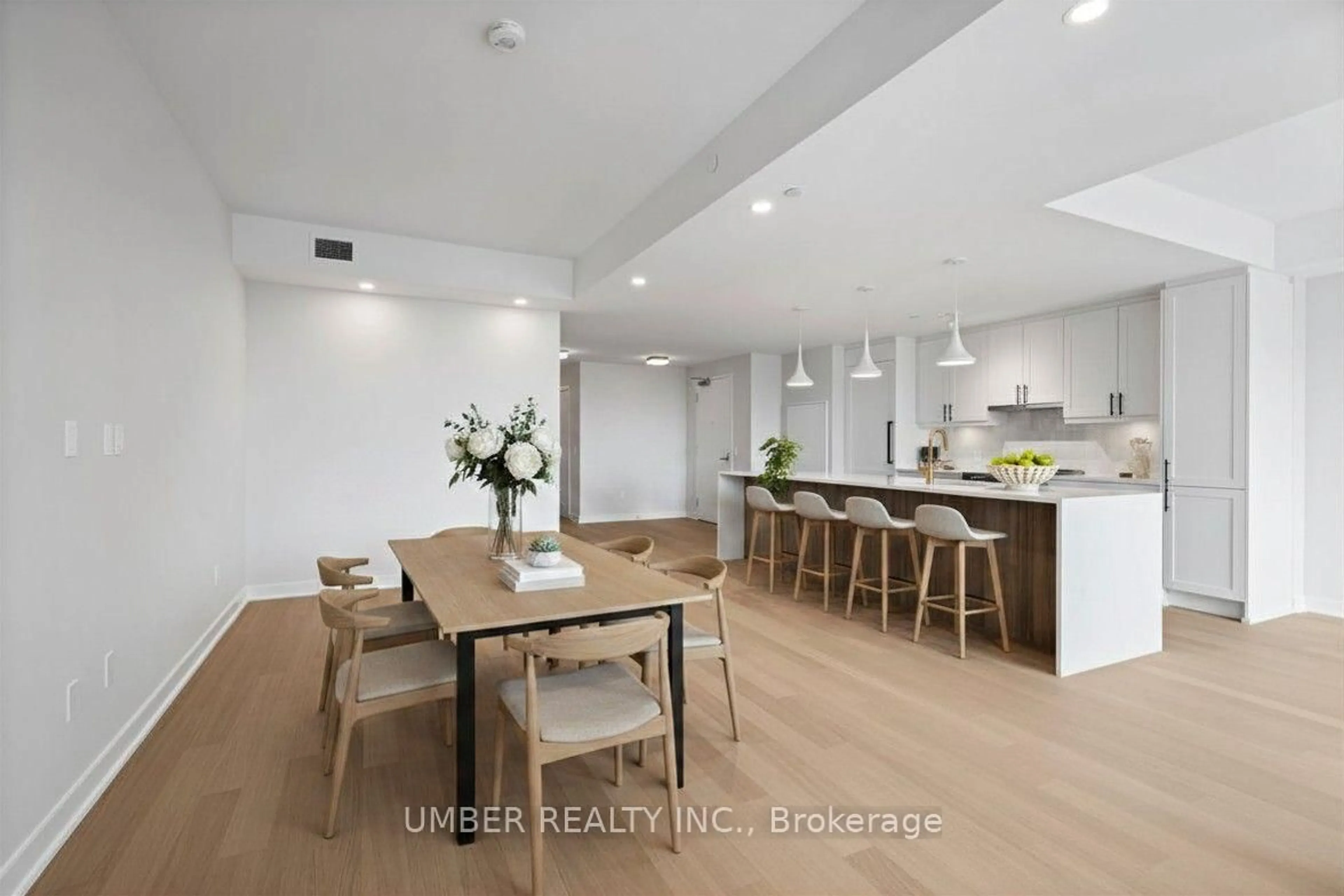 Open concept kitchen, wood/laminate floor for 360 Deschatelets Ave #706, Ottawa Ontario K1S 5Y1