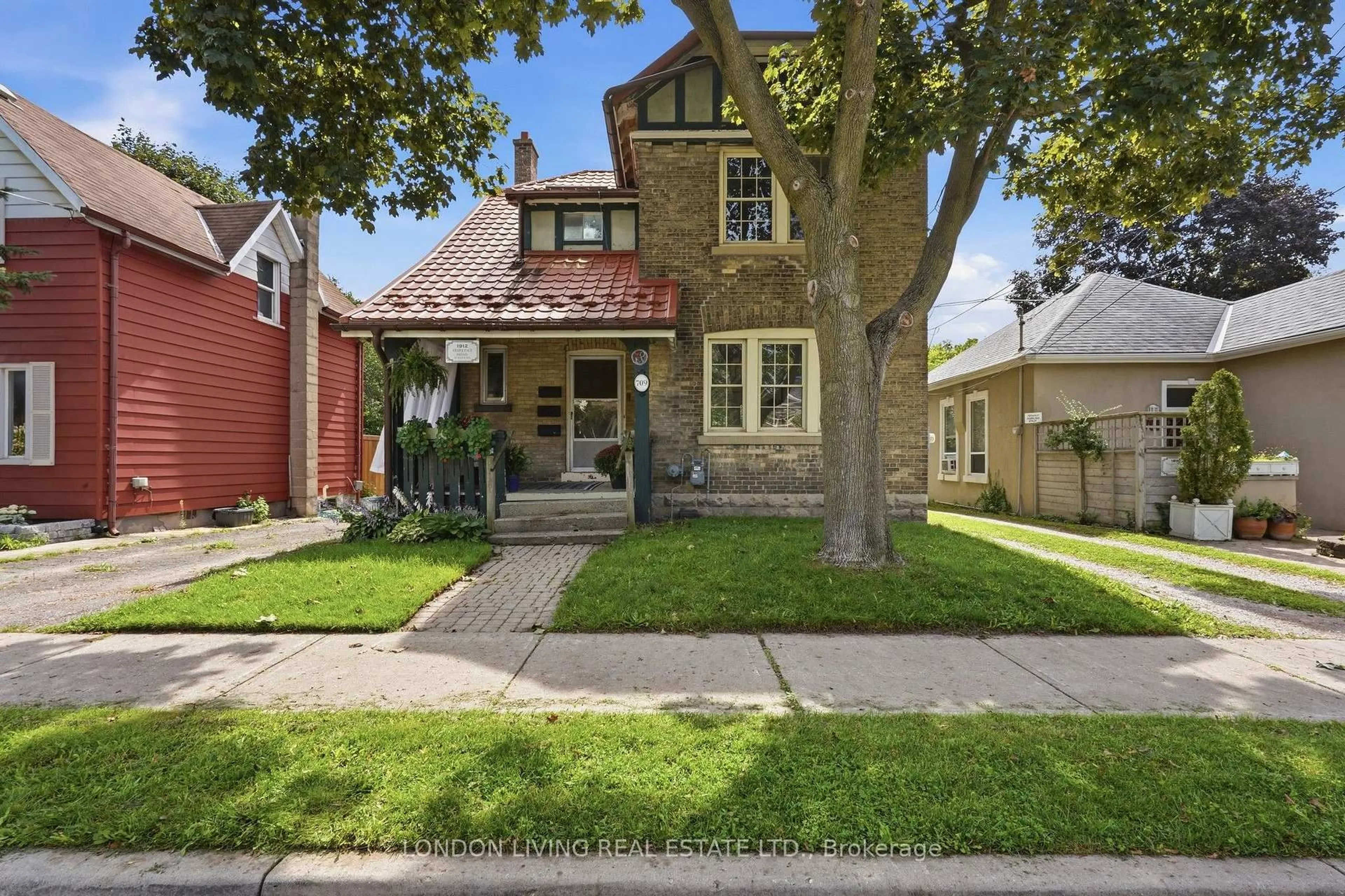 Home with brick exterior material, street for 709 Princess Ave, London East Ontario N5W 3M2