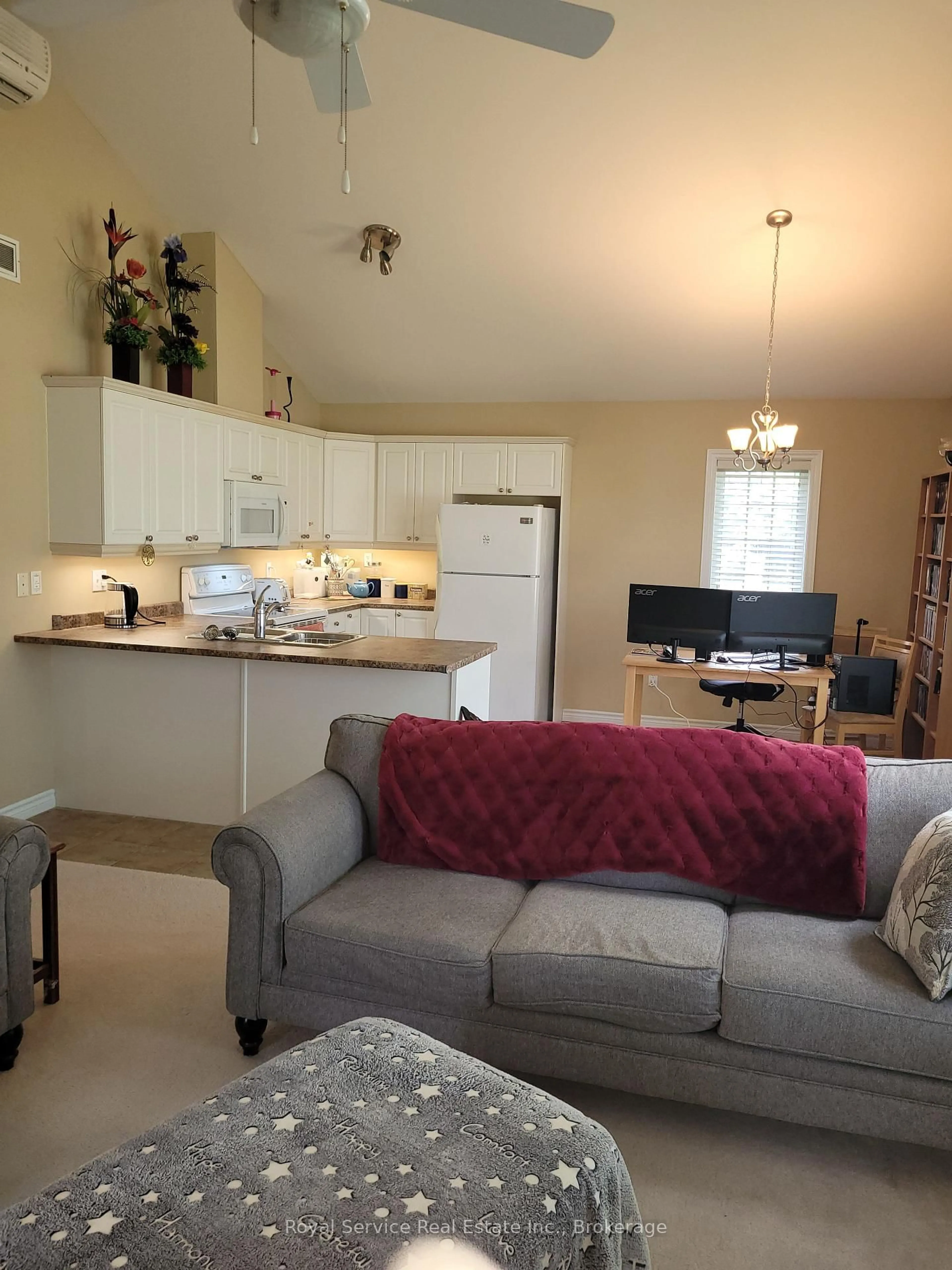 Living room with furniture, unknown for 325 Densmore Rd #102, Cobourg Ontario K9A 0E4
