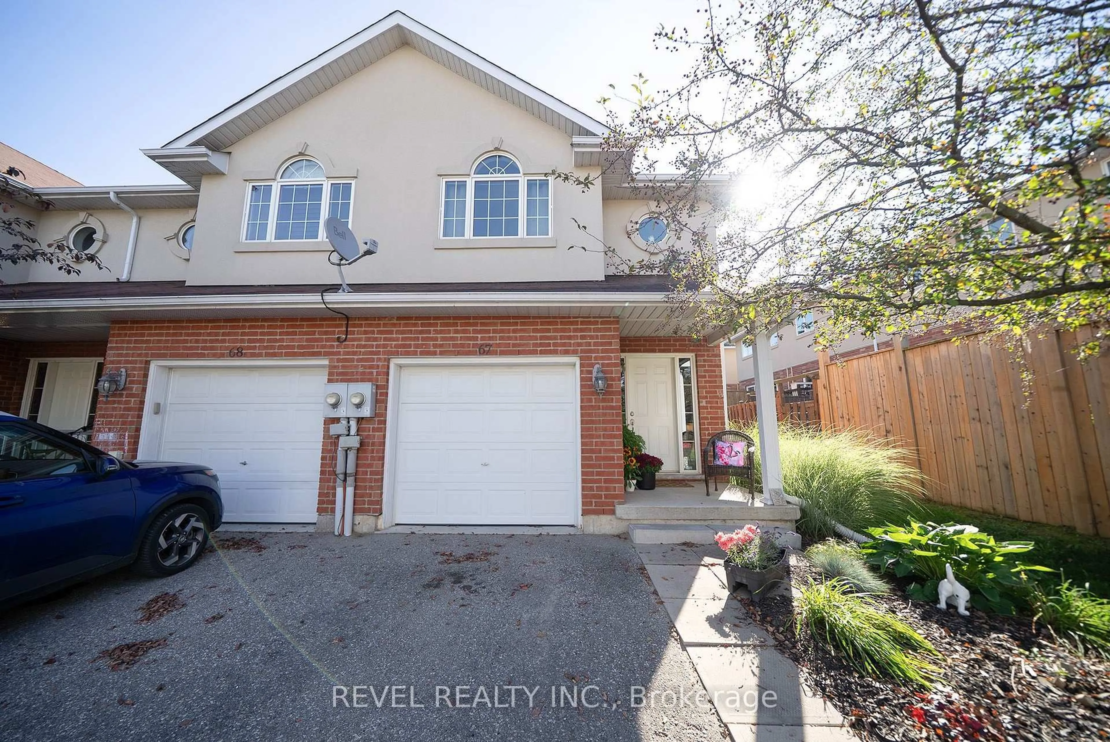 A pic from outside/outdoor area/front of a property/back of a property/a pic from drone, street for 20 McConkey Cres #67, Brantford Ontario N3S 0C1