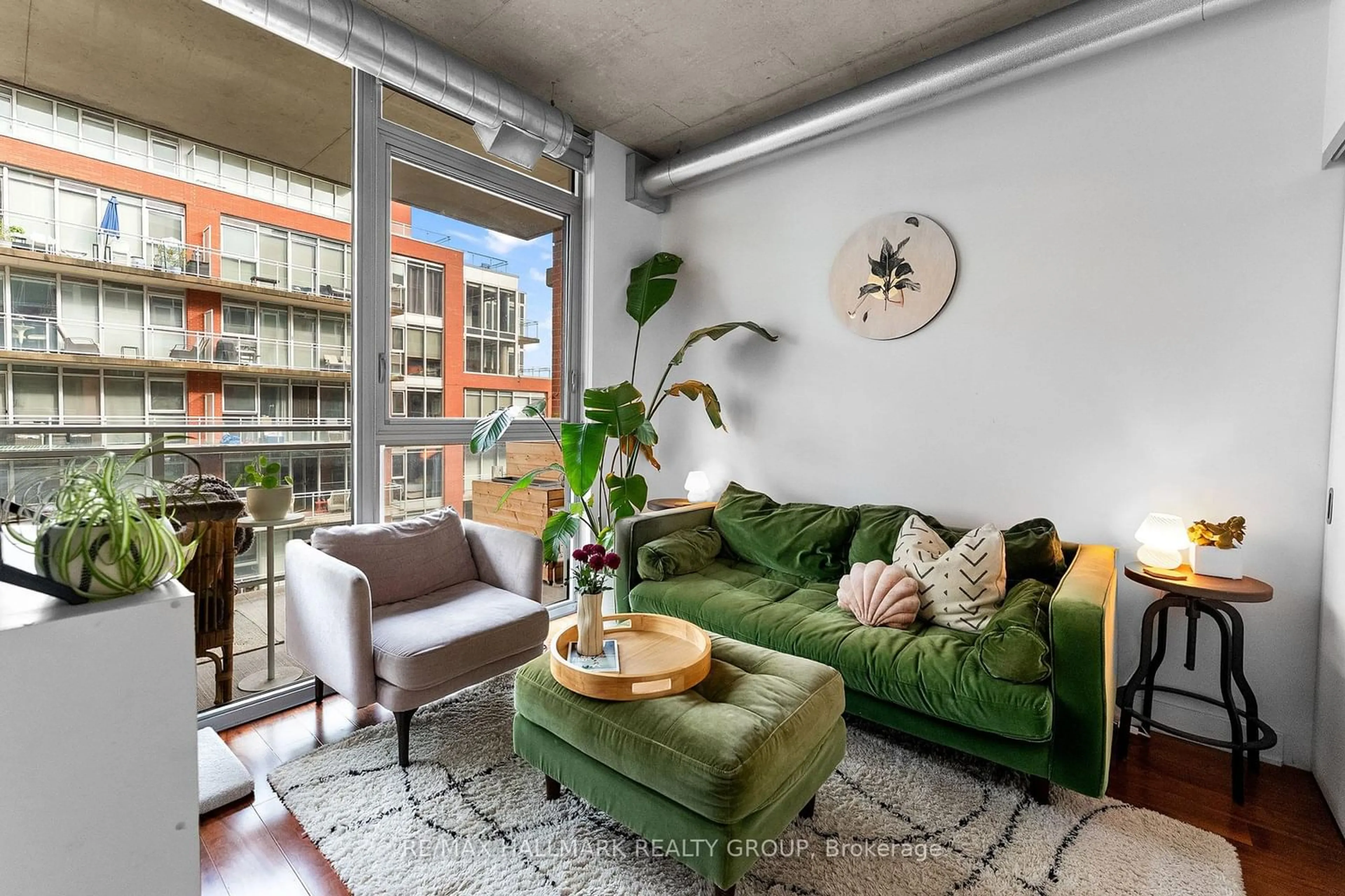 Living room with furniture, cement floor for 360 Mcleod St #515, Ottawa Ontario K2P 1A9