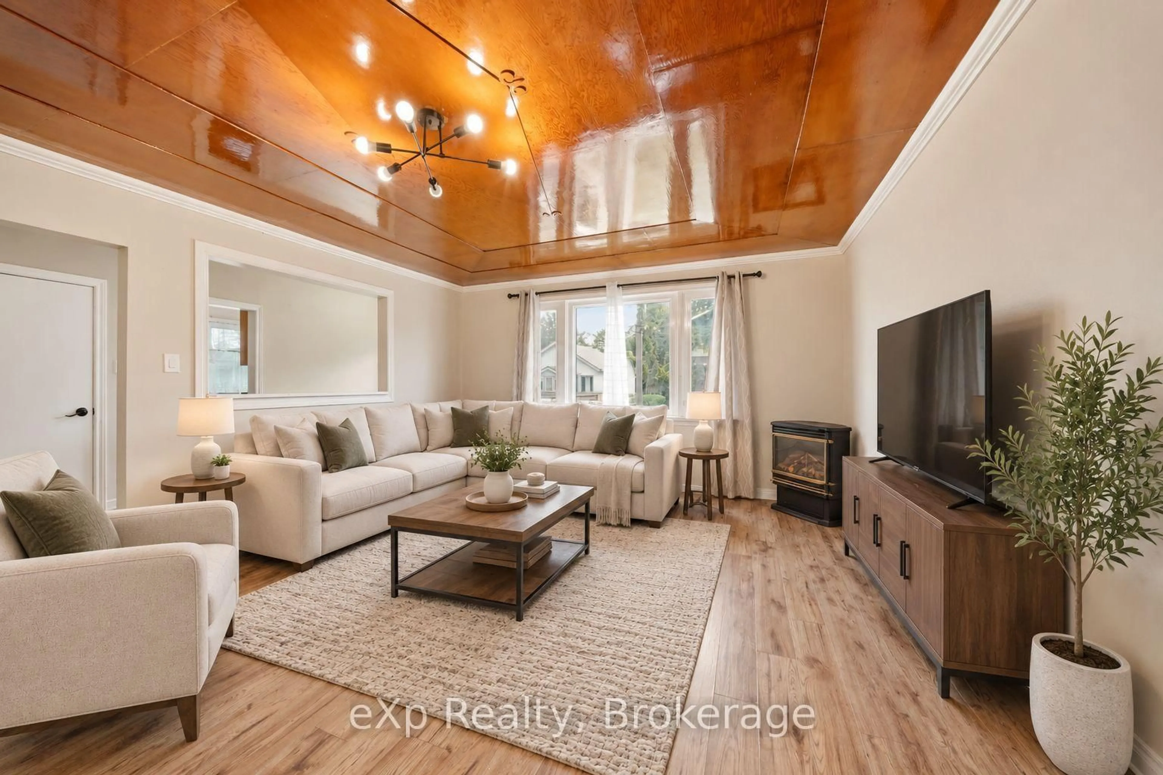 Living room with furniture, wood/laminate floor for 17 Burton St, Belleville Ontario K8P 1E5