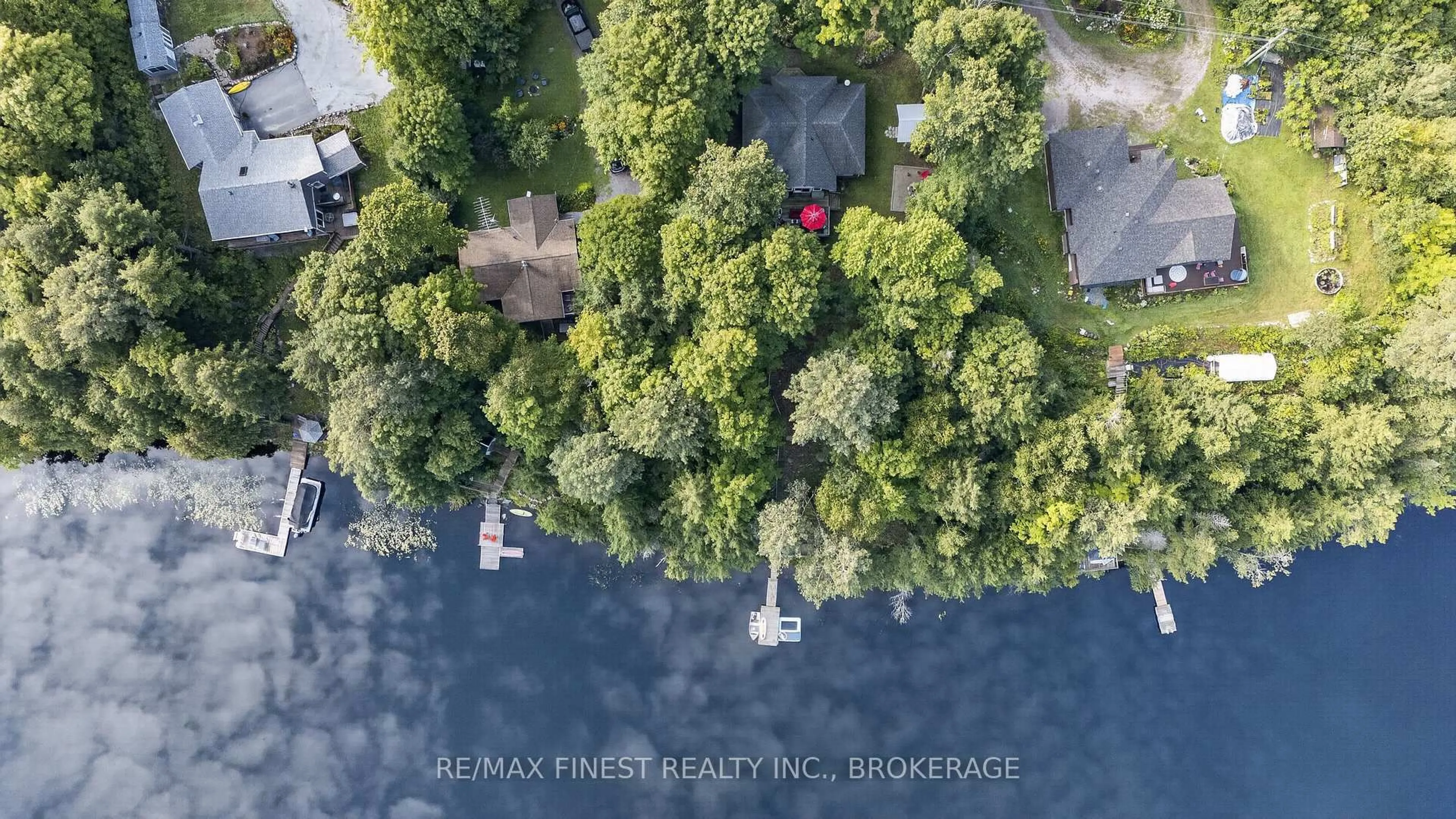 A pic from outside/outdoor area/front of a property/back of a property/a pic from drone, water/lake/river/ocean view for 1068 Pleasant Hill Lane, Arden Ontario K0H 1B0